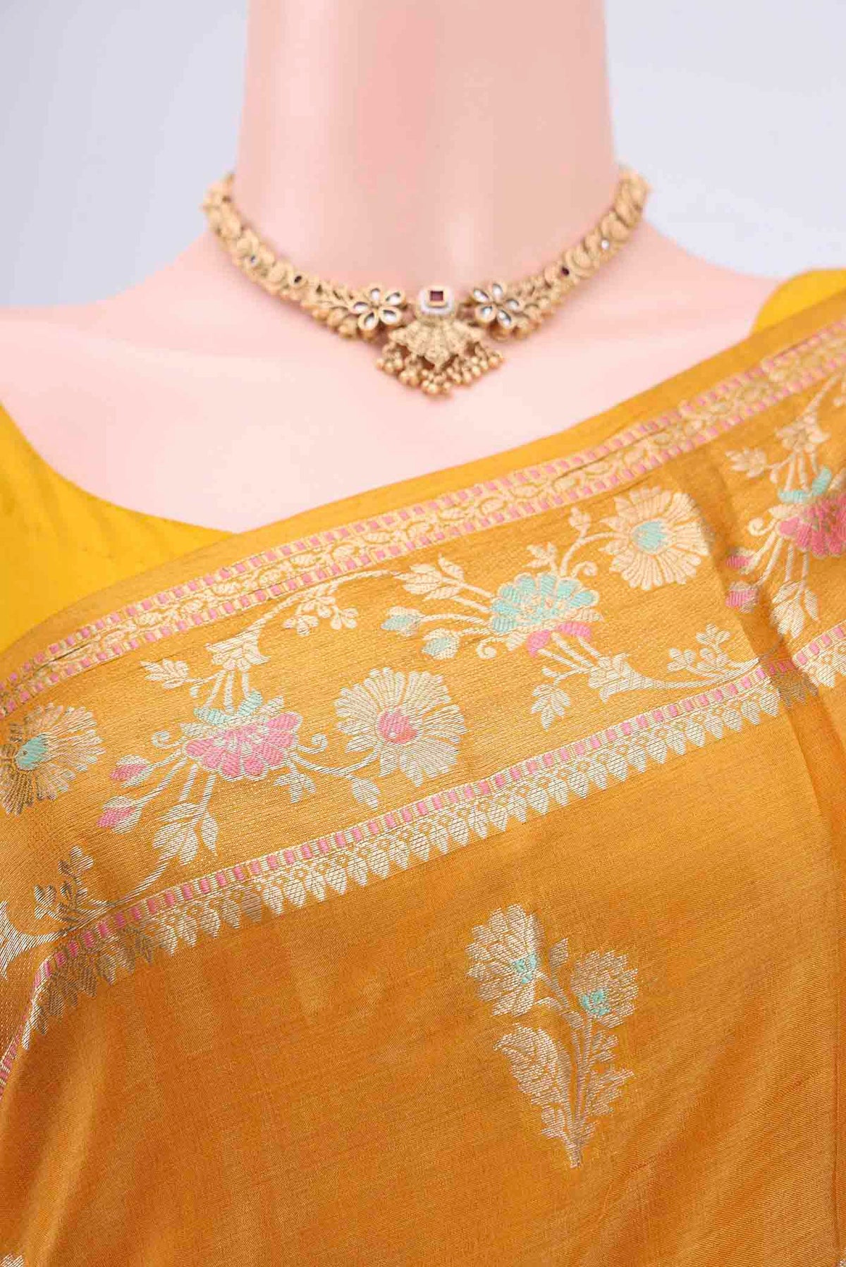 Border image of Mustard Banarasi Tussar Silk Saree with Zari Butta on the body and Zari Border. 