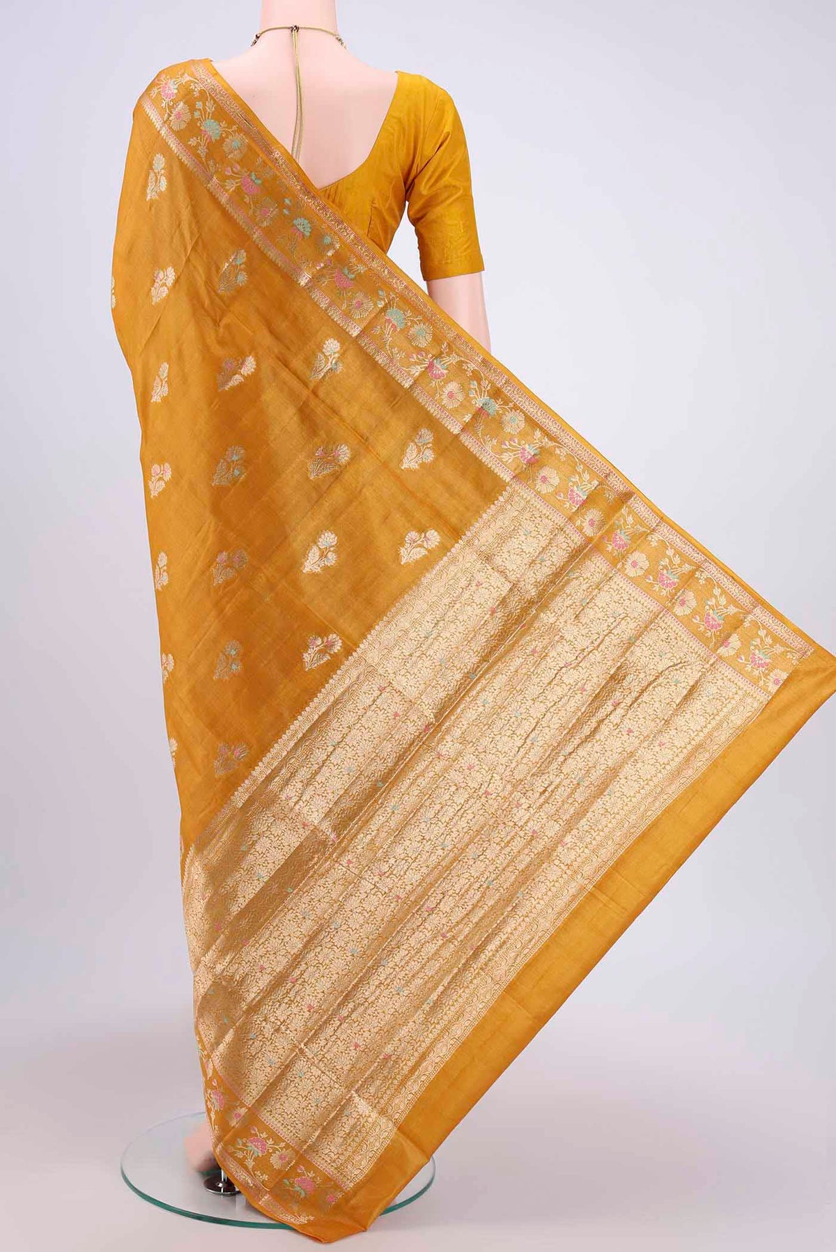 Flat view of Mustard Banarasi Tussar Silk Saree with Zari Butta on the body and Zari Border. 