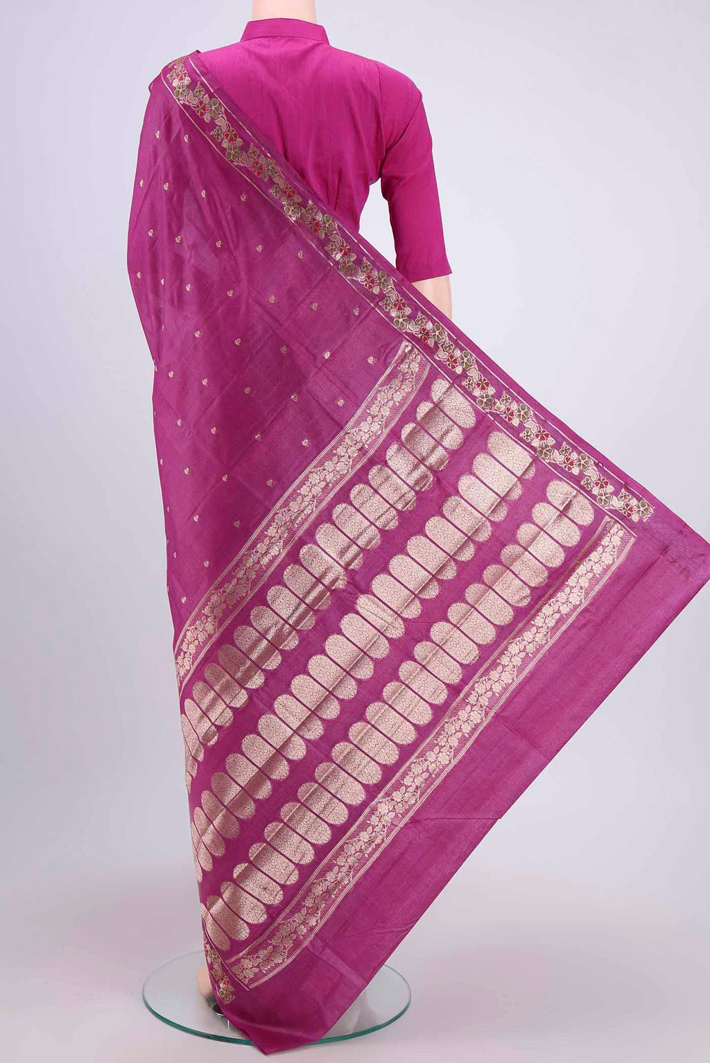Flat view of Mauve Banarasi Tussar Silk Saree with Zari Butta on the body and Zari Border. 