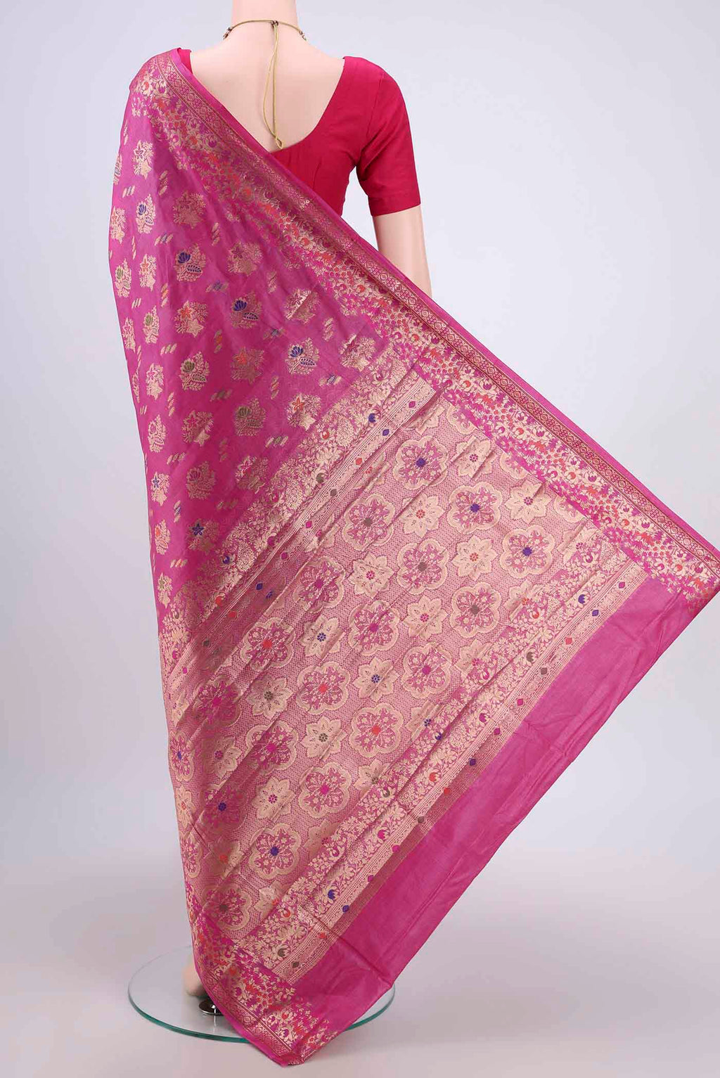 Flat view of Pink Banarasi Tussar Silk Saree with Zari Butta on the body and Zari And Thread Border. 
