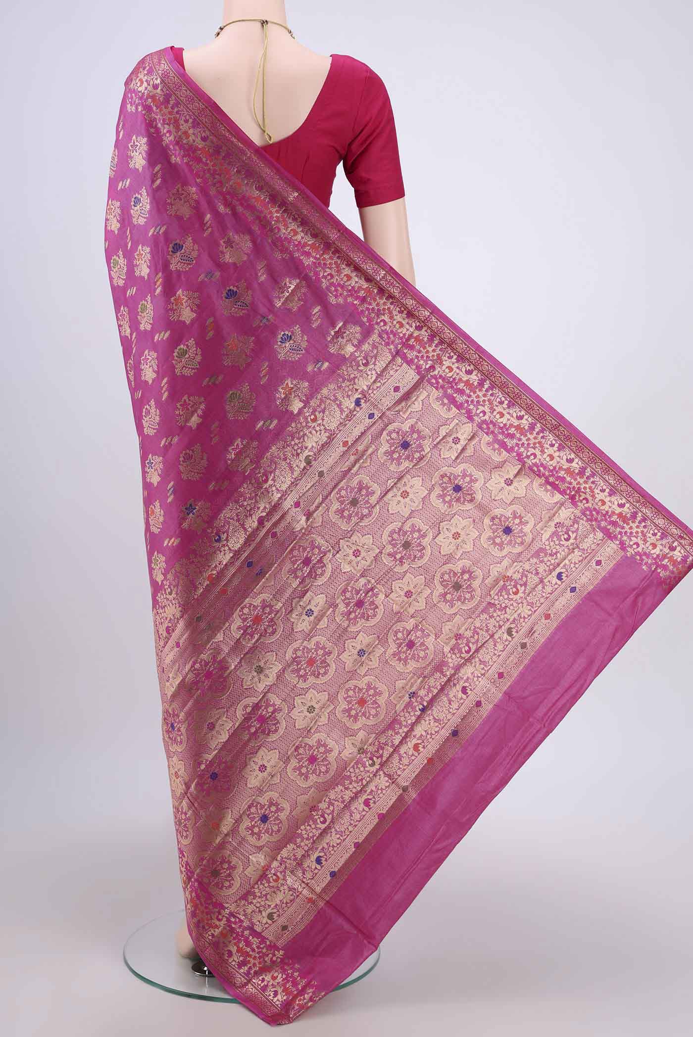 Flat view of Pink Banarasi Tussar Silk Saree with Zari Butta on the body and Zari And Thread Border. 