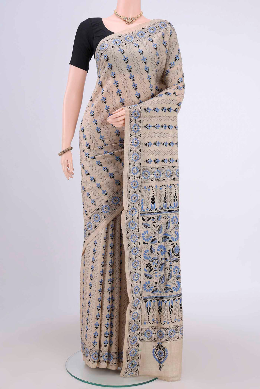 Beige Kantha Silk Saree with Kantha Work on the body and Thread Border.  displayed on a mannequin