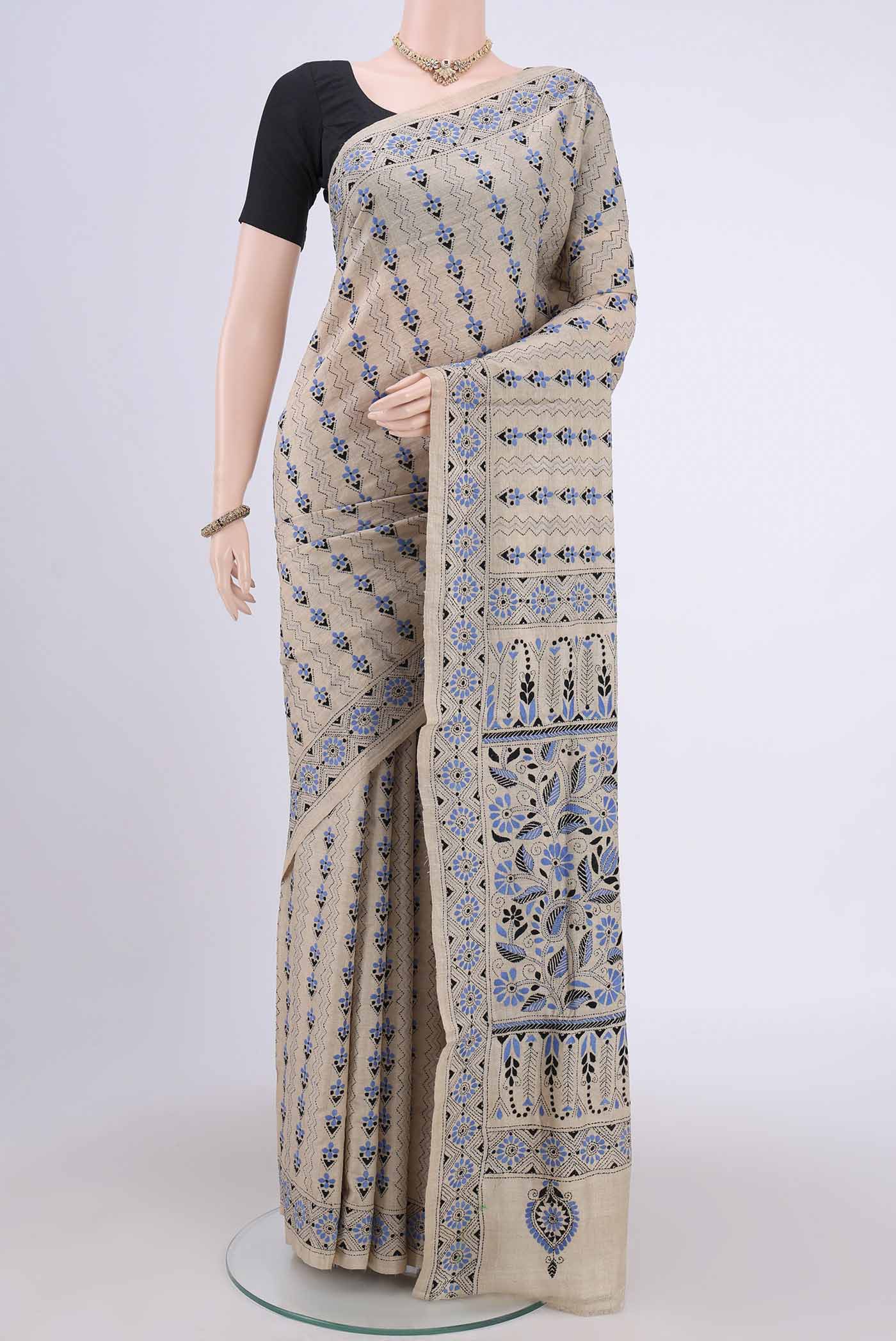 Beige Kantha Silk Saree with Kantha Work on the body and Thread Border.  displayed on a mannequin