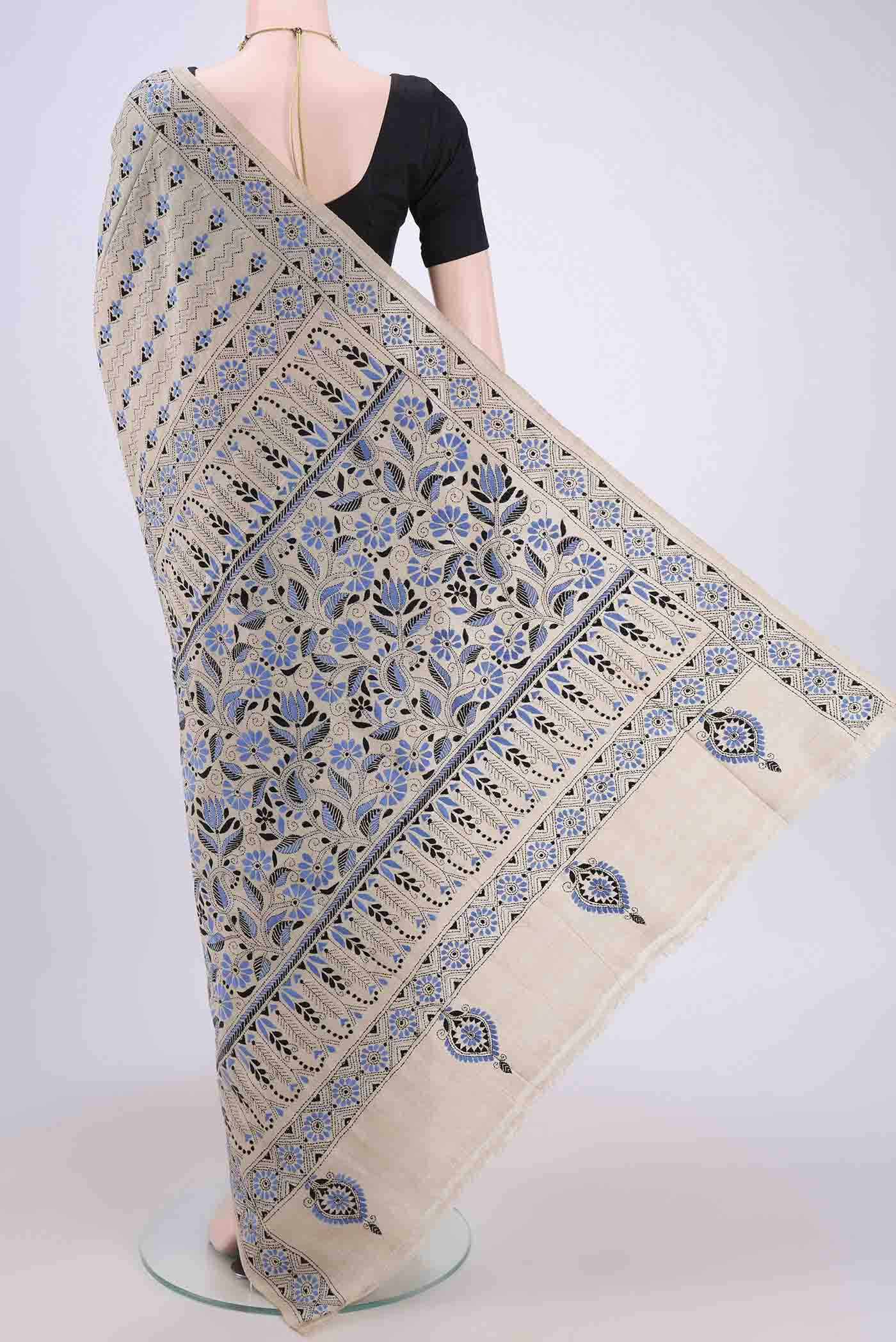 Flat view of Beige Kantha Silk Saree with Kantha Work on the body and Thread Border. 