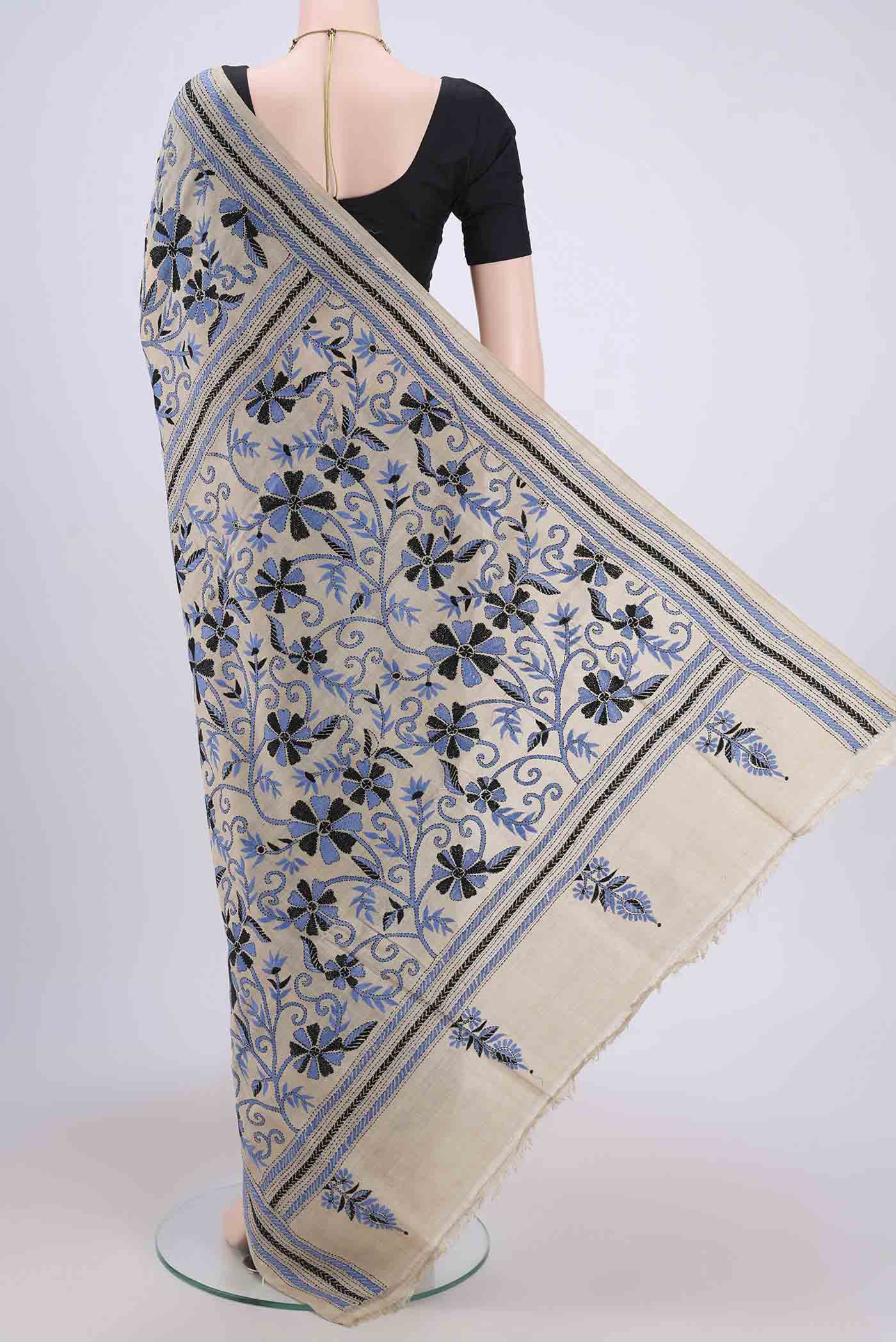 Flat view of Beige Kantha Silk Saree with Kantha Work on the body and Thread Border. 