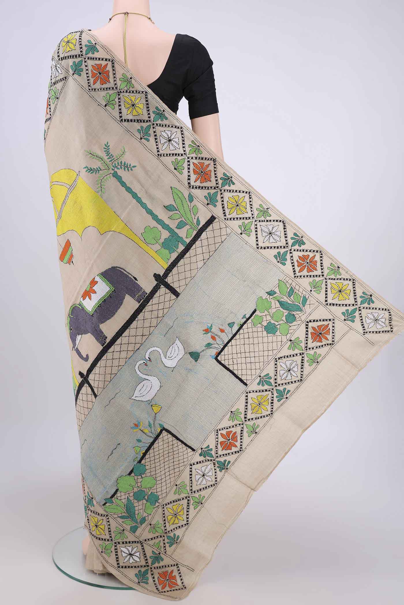 Flat view of Beige Kantha Silk Saree with Kantha Work on the body and Thread Border. 