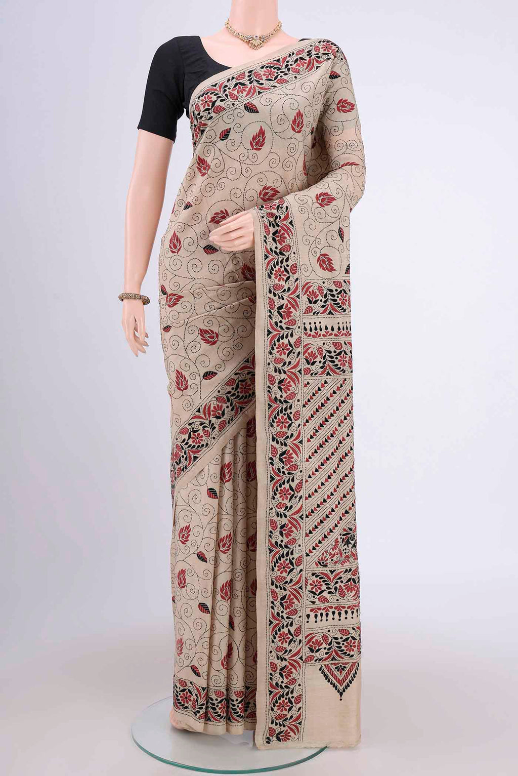 Beige Kantha Silk Saree with Kantha Work on the body and Thread Border.  displayed on a mannequin