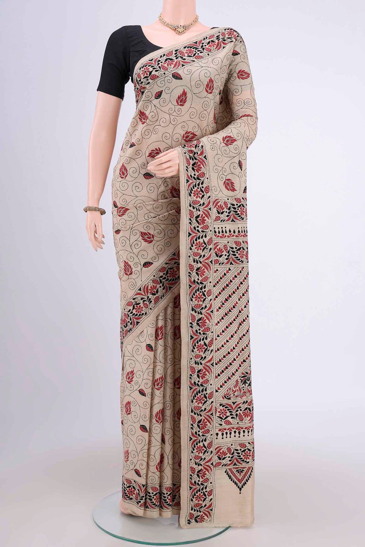 Beige Kantha Silk Saree with Kantha Work on the body and Thread Border.  displayed on a mannequin