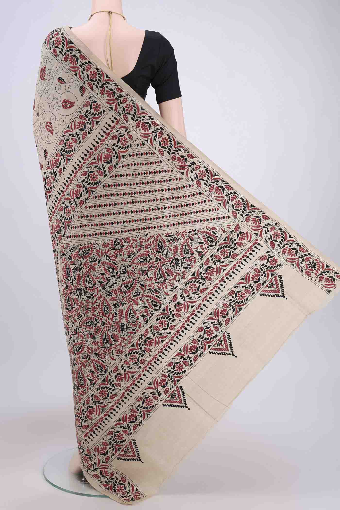 Flat view of Beige Kantha Silk Saree with Kantha Work on the body and Thread Border. 