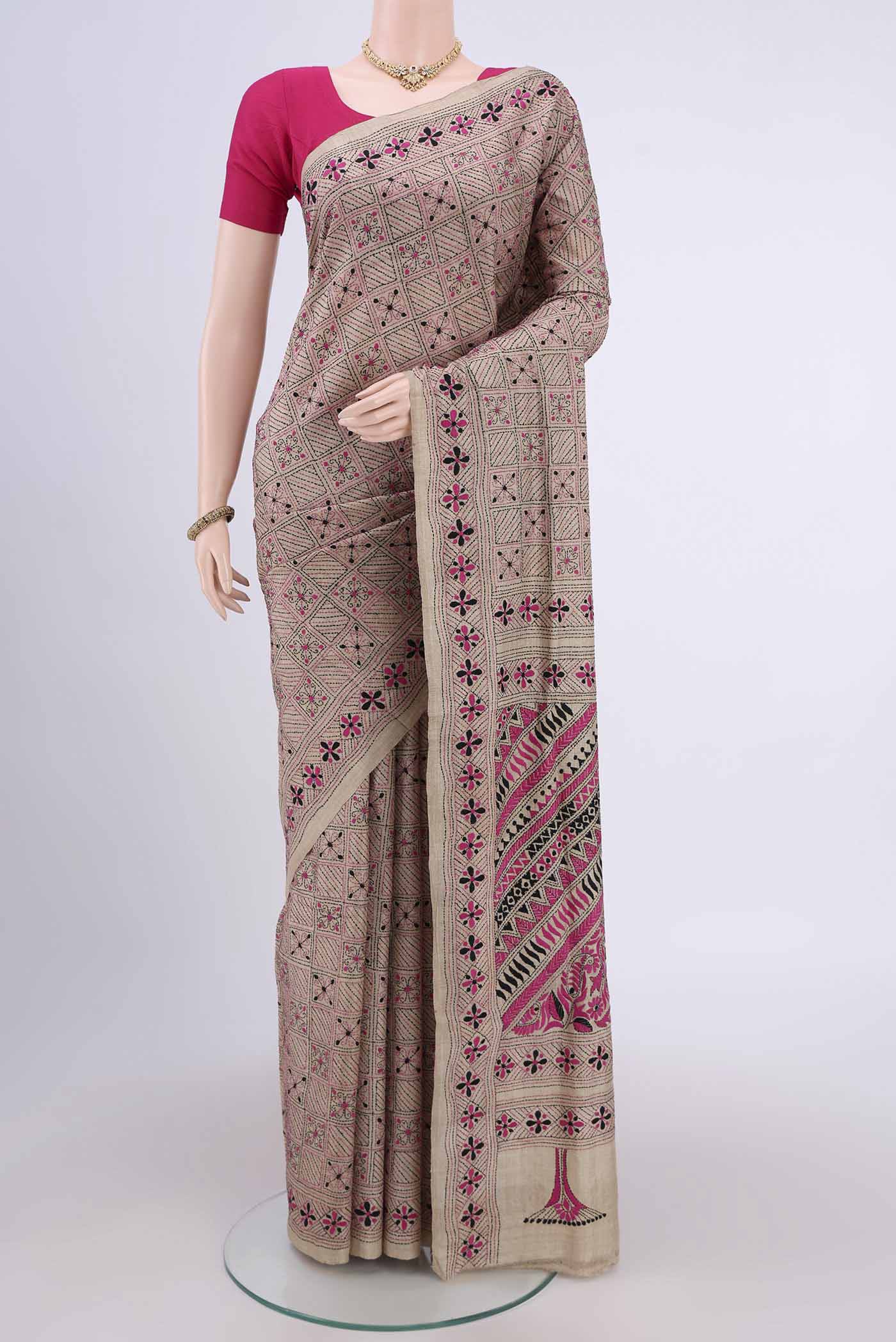 Beige Kantha Silk Saree with Kantha Work on the body and Thread Border.  displayed on a mannequin