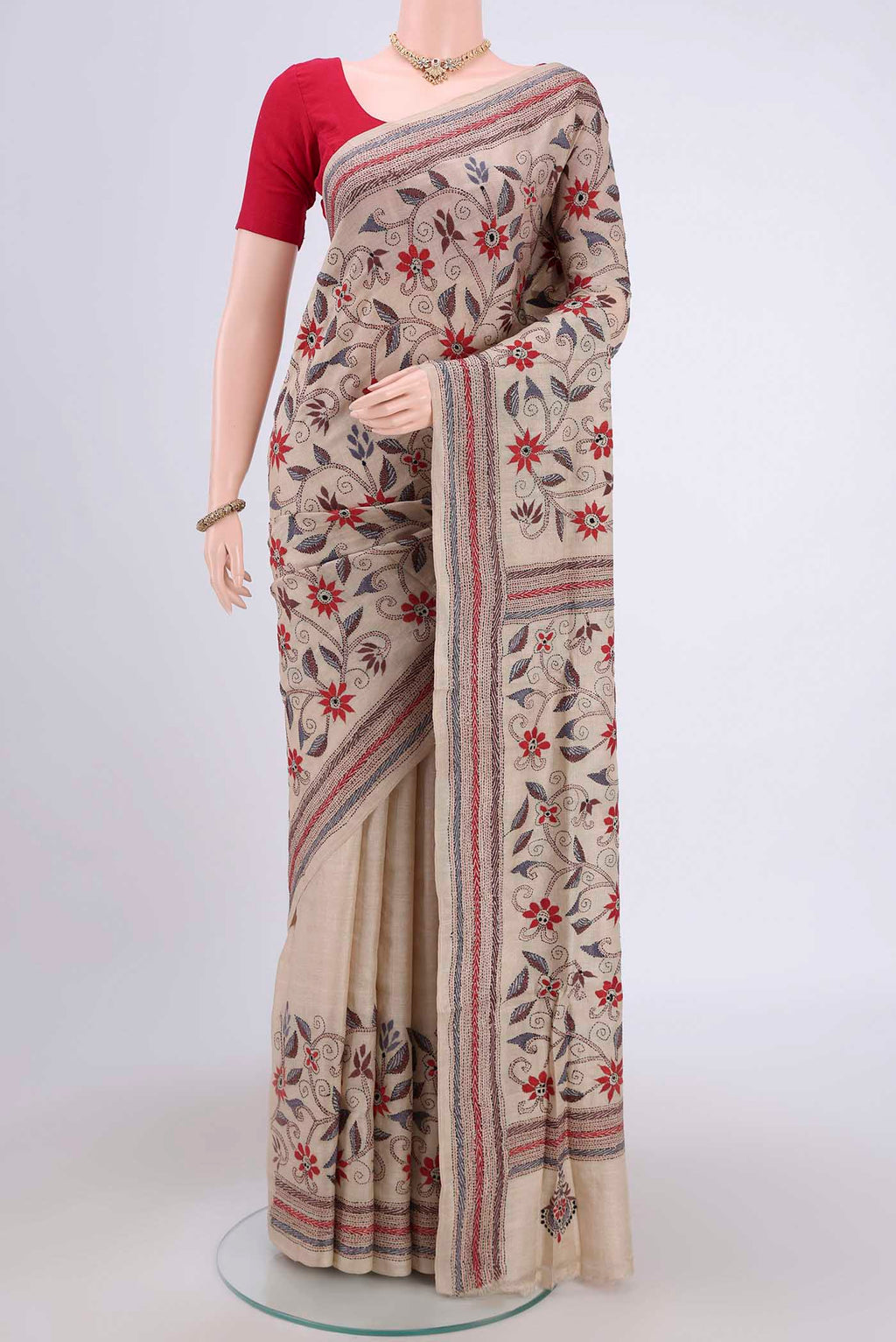 Beige Kantha Silk Saree with Kantha Work on the body and Thread Border.  displayed on a mannequin
