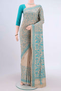 Beige Kantha Silk Saree with Kantha Work on the body and Thread Border.  displayed on a mannequin