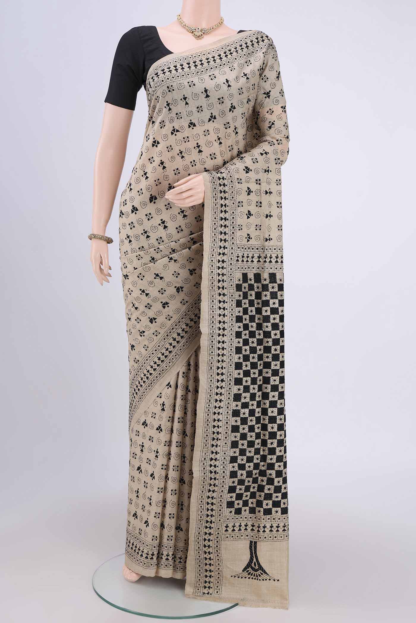 Beige Kantha Silk Saree with Kantha Work on the body and Thread Border.  displayed on a mannequin