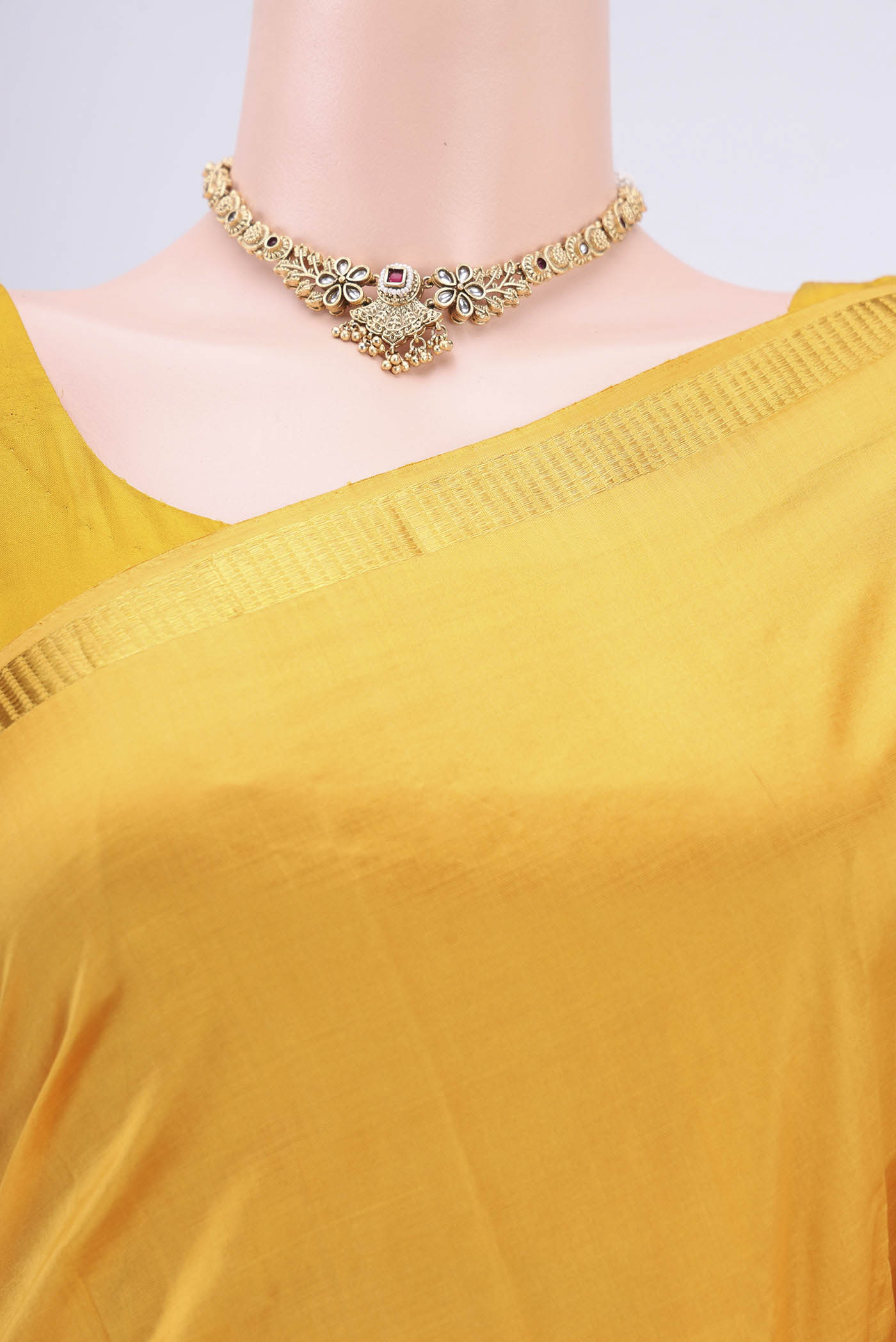 Border image of Yellow Kanchipuram Saree with Plain Body and Zari Border. 