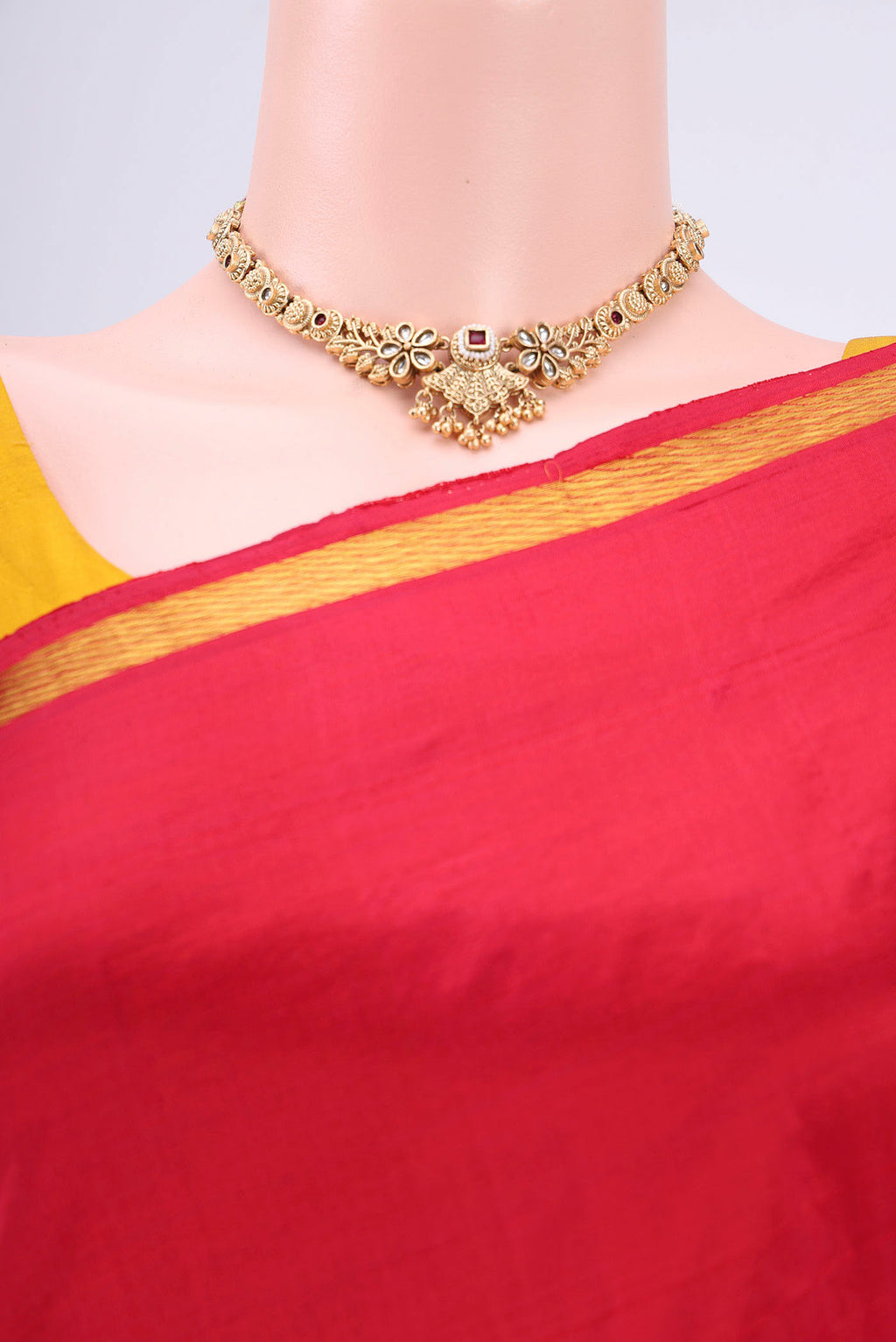 Border image of Red Kanchipuram Silk Saree with Plain Body and Zari Border. 