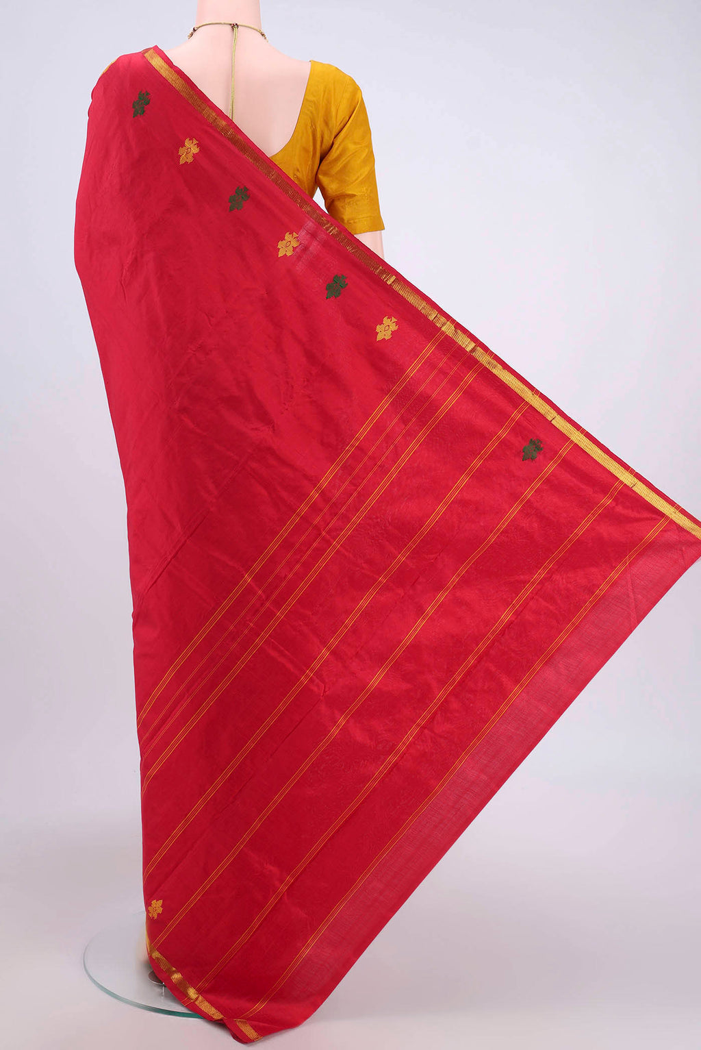 Flat view of Red Kanchipuram Silk Saree with Plain Body and Zari Border. 