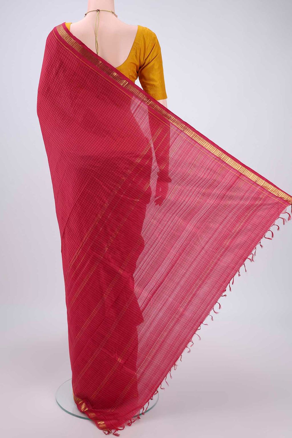 Flat view of Maroon Dual Tone Kanchipuram Silk Saree with Checked design on the body and Zari Border. 