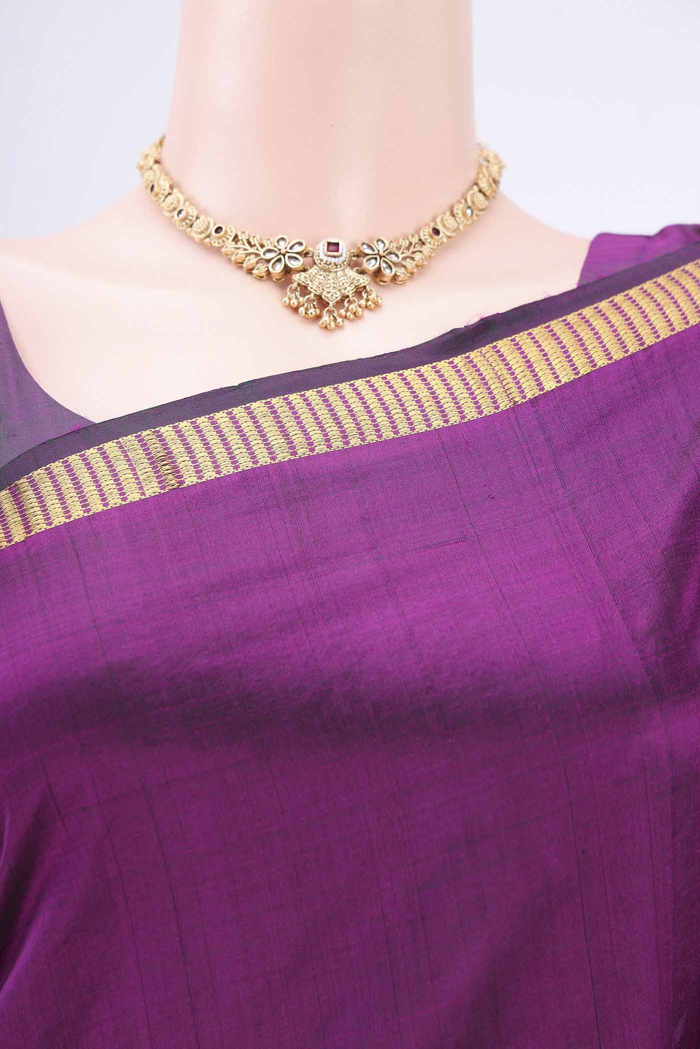 Border image of Purple Kanchipuram Saree with Plain Body and Zari Border. 