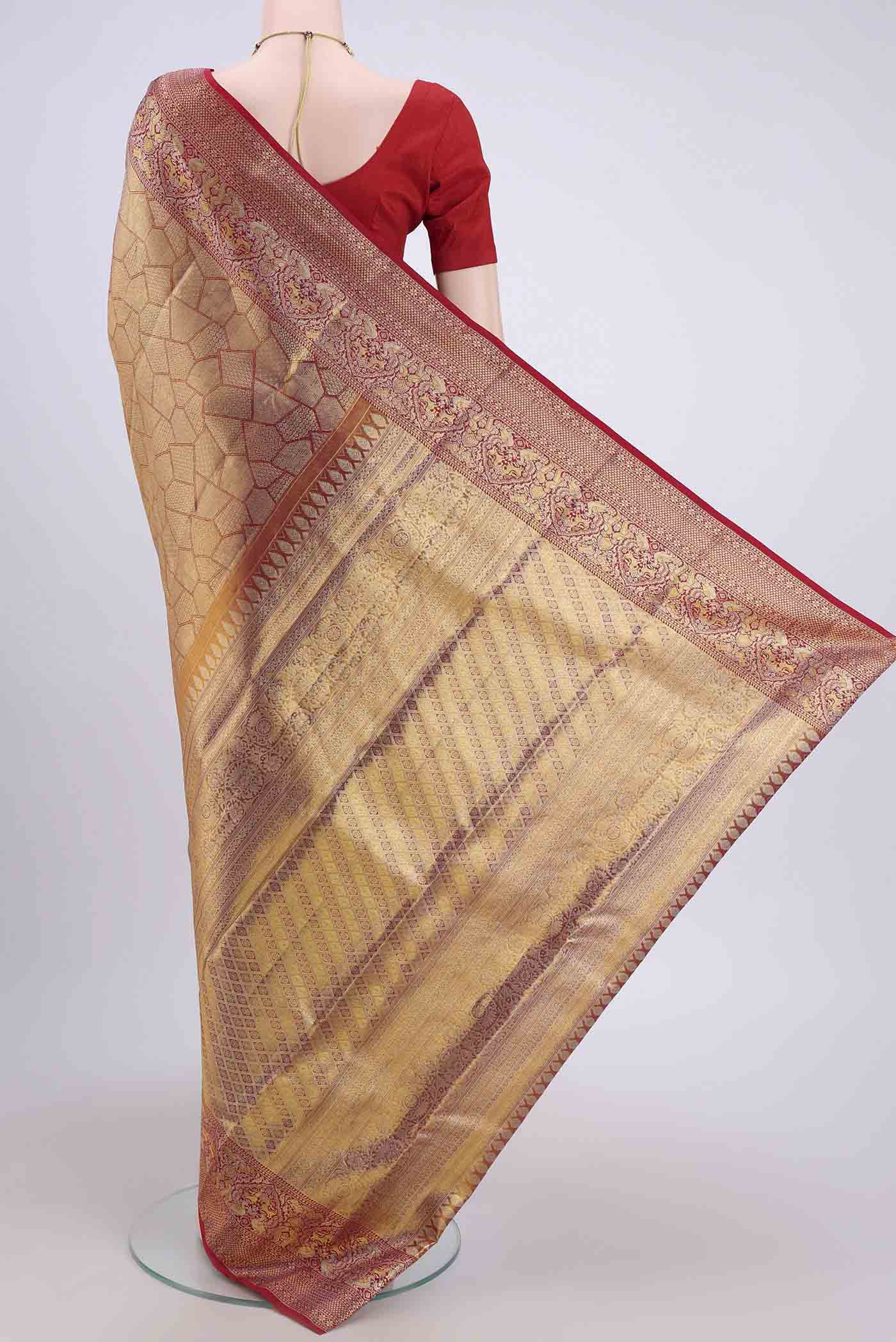 Flat view of Maroon Kanchipuram Saree with Zari Brocade on the body and Zari Border. 