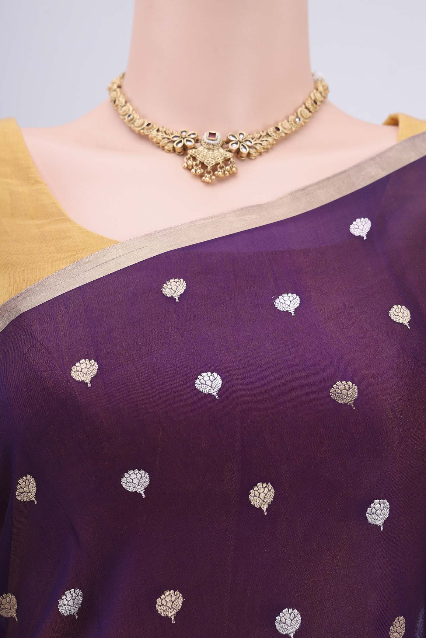 Border image of Purple Organza Silk Saree with Zari Butta on the body and Zari Border. 