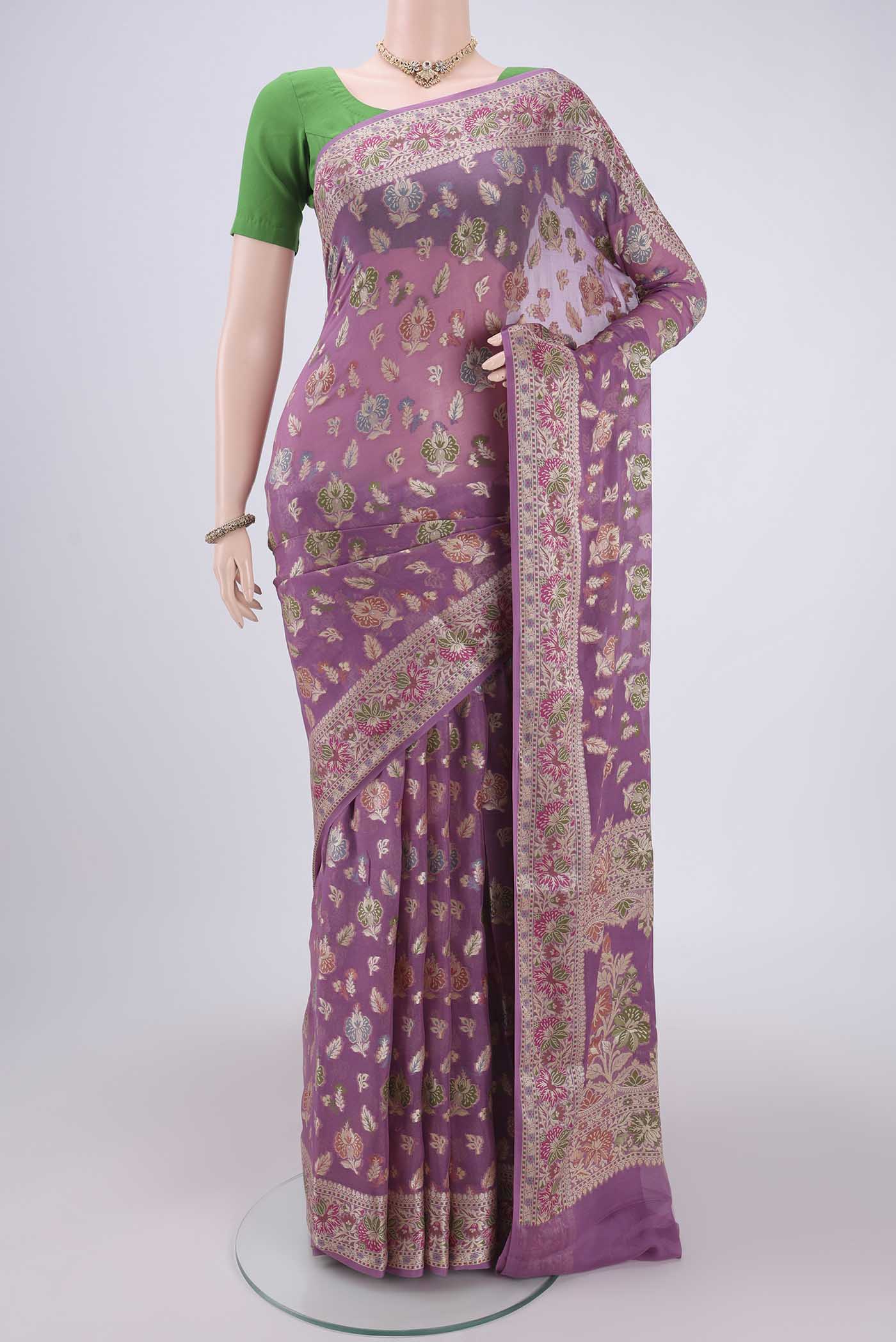 Mauve Blended Banarasi Georgette Saree with Thread Brocade on the body and Thread Border.  displayed on a mannequin