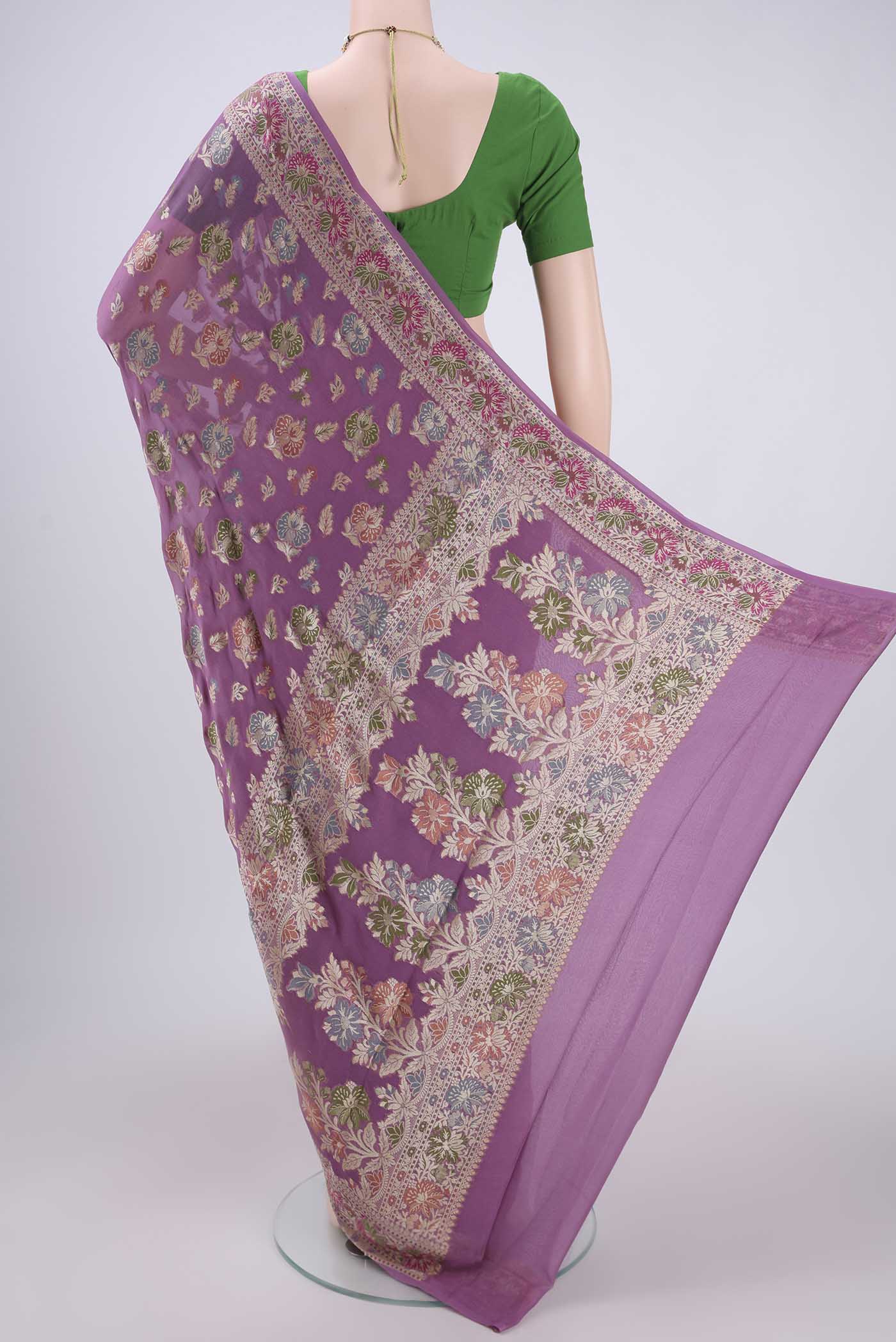 Flat view of Mauve Blended Banarasi Georgette Saree with Thread Brocade on the body and Thread Border. 