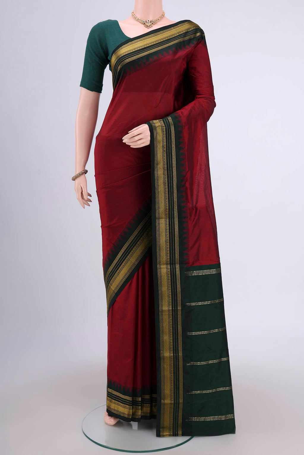 Maroon Dual Tone Blended Bangalore Silk Saree with Plain Body and Zari Border.  displayed on a mannequin