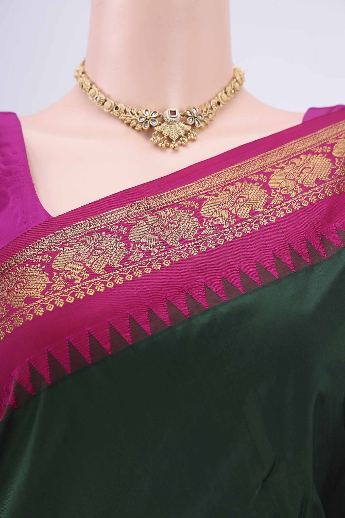 Border image of Bottle Green Dual Tone Blended Bangalore Silk Saree with Plain Body and Zari Border. 
