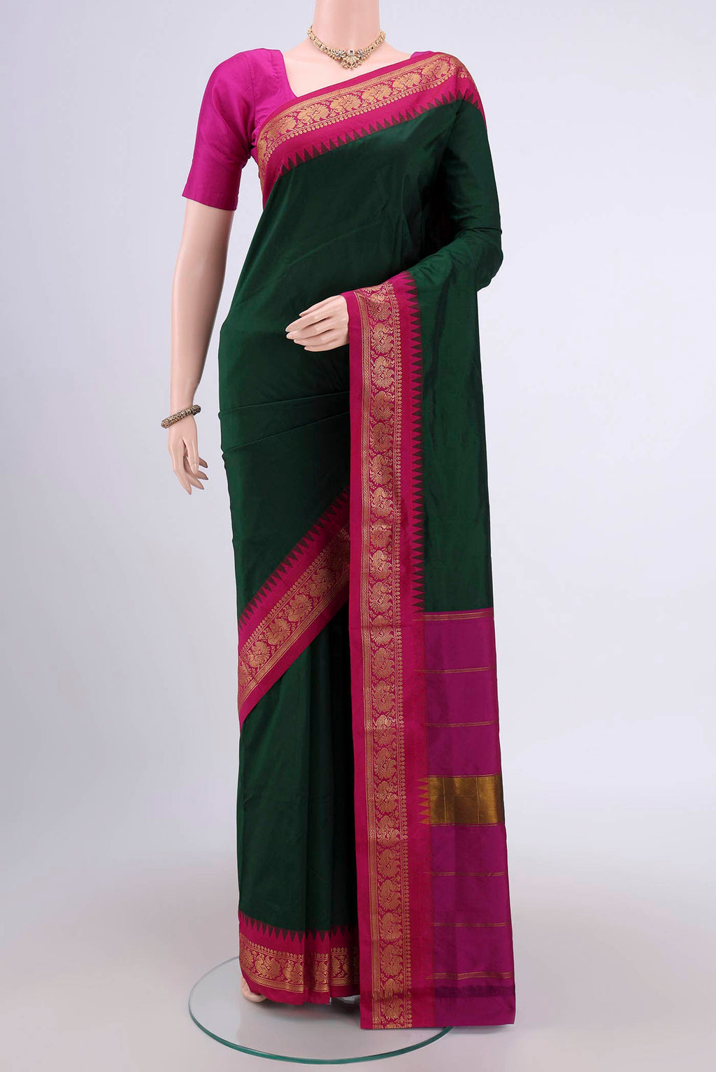 Bottle Green Dual Tone Blended Bangalore Silk Saree with Plain Body and Zari Border.  displayed on a mannequin