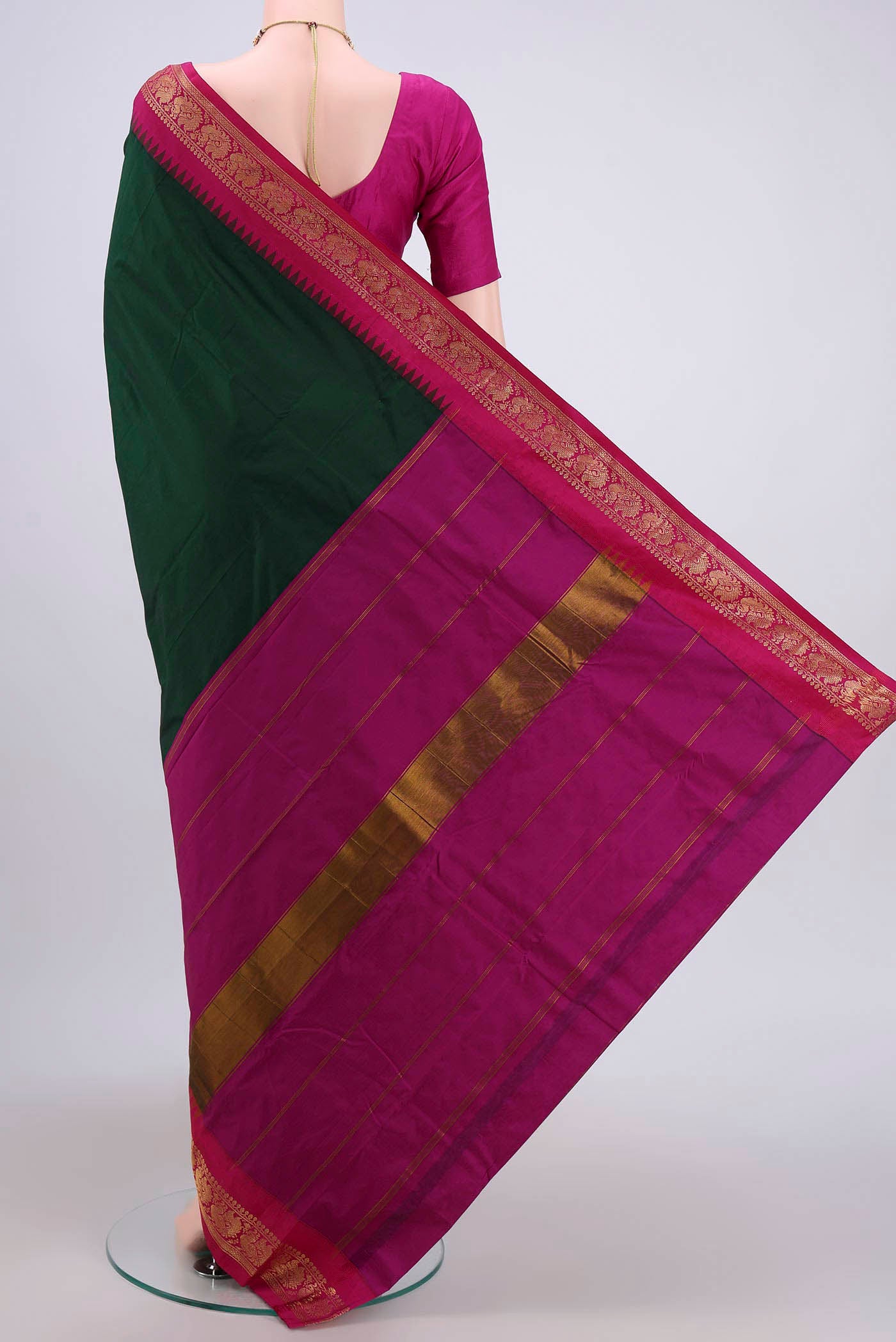 Flat view of Bottle Green Dual Tone Blended Bangalore Silk Saree with Plain Body and Zari Border. 