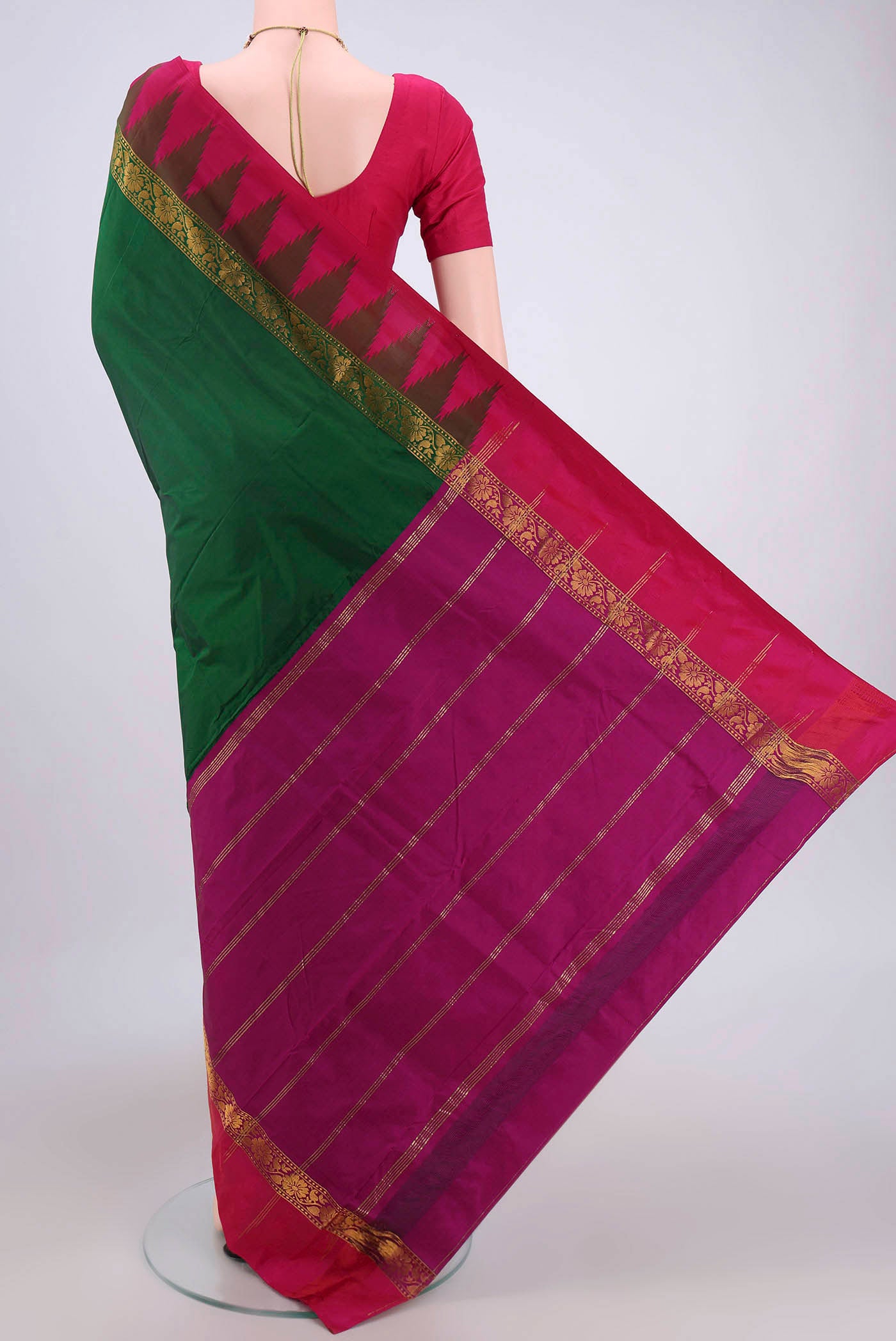 Flat view of Bottle Green Blended Bangalore Silk Saree with Zari Butta on the body and Zari Border. 