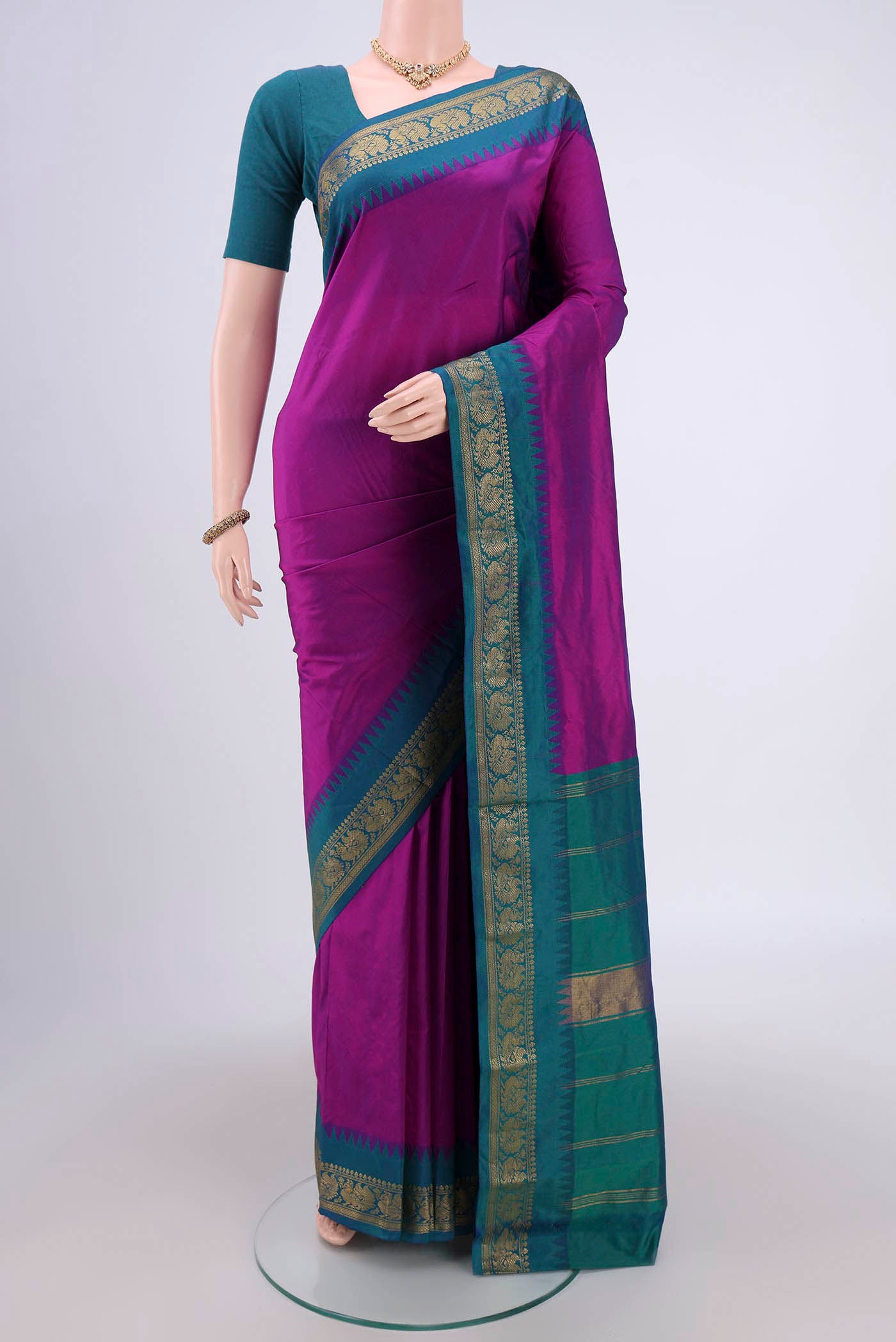 Purple Dual Tone Blended Bangalore Silk Saree with Plain Body and Zari Border.  displayed on a mannequin