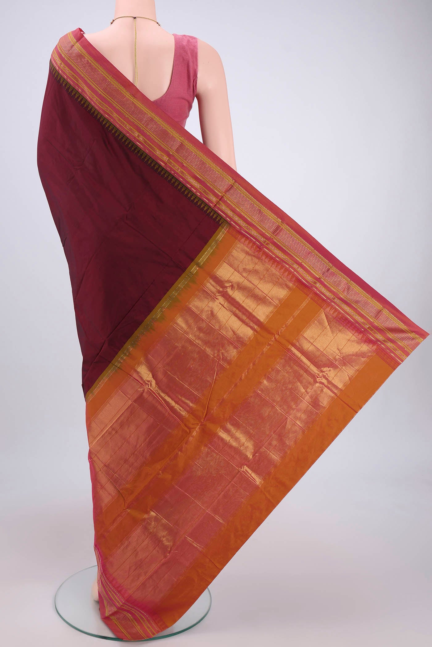 Flat view of Maroon Blended Bangalore Silk Saree with Plain Body and Temple Border. 