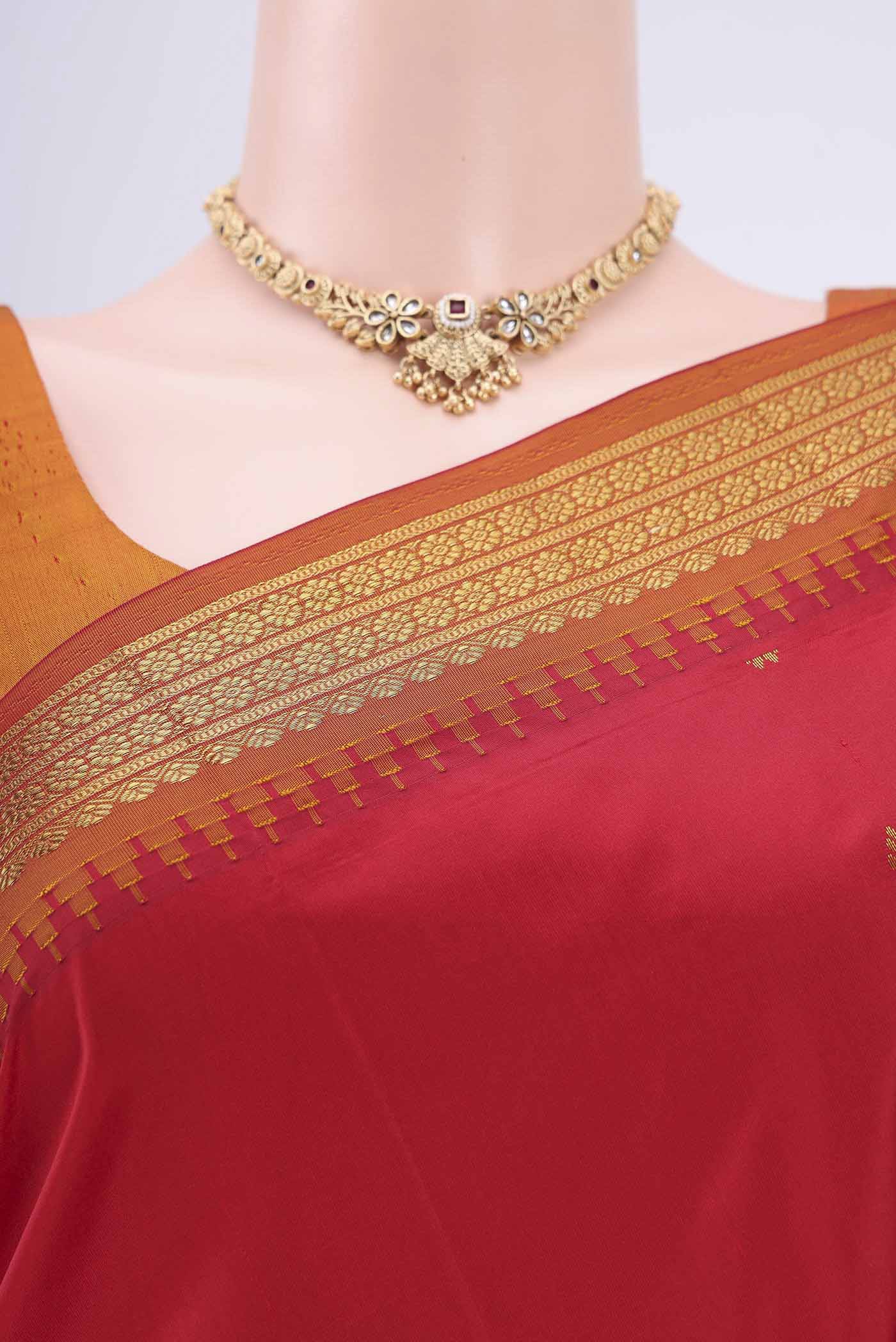 Border image of Red Dual Tone Blended Bangalore Silk Saree with Zari Butta on the body and Temple Border. 