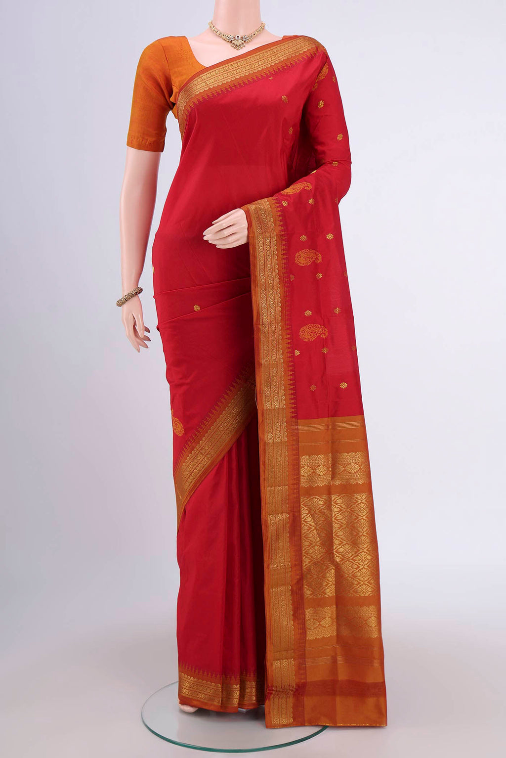 Red Dual Tone Blended Bangalore Silk Saree with Zari Butta on the body and Temple Border.  displayed on a mannequin