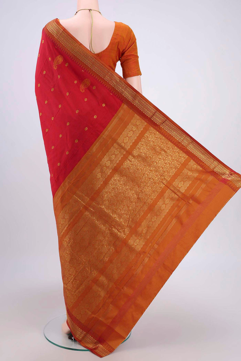 Flat view of Red Dual Tone Blended Bangalore Silk Saree with Zari Butta on the body and Temple Border. 