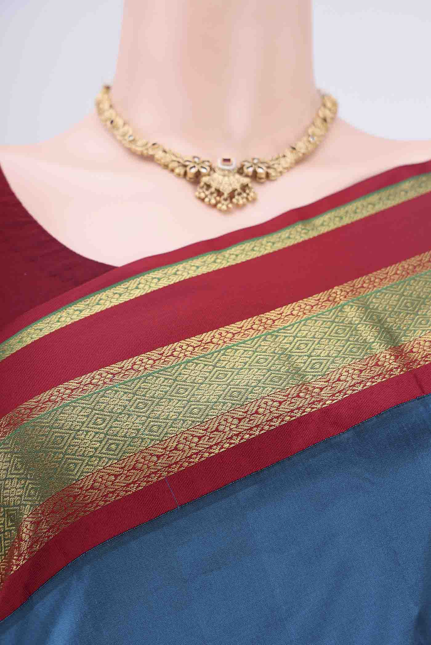 Border image of Blue Blended Bangalore Silk Saree with Zari Butta on the body and Zari Border. 