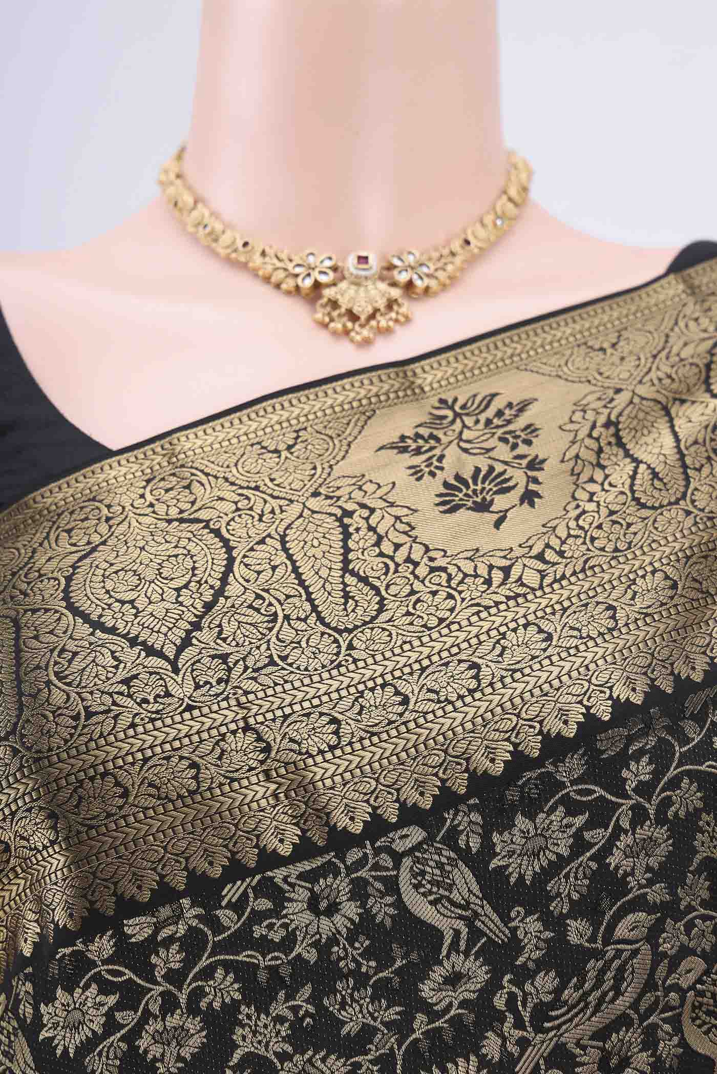 Border image of Black Bangalore Silk Saree with Zari Brocade on the body and Zari Border. 