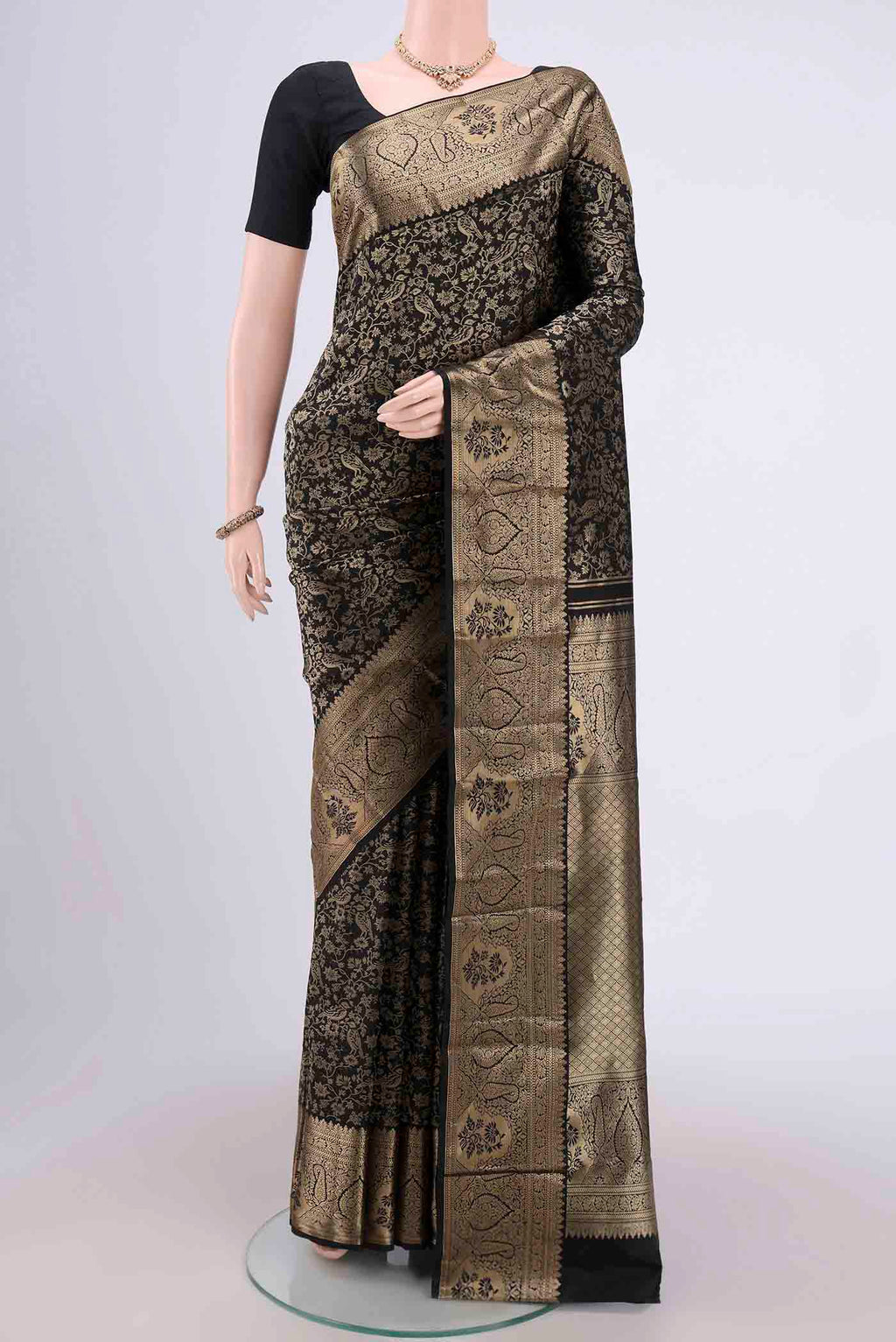 Black Bangalore Silk Saree with Zari Brocade on the body and Zari Border.  displayed on a mannequin