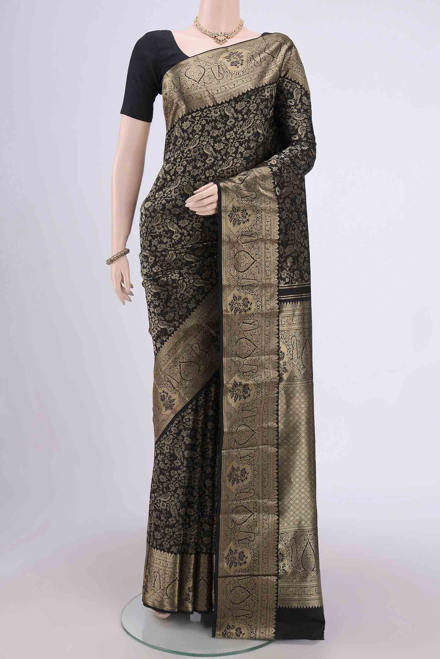 Black Bangalore Silk Saree with Zari Brocade on the body and Zari Border.  displayed on a mannequin