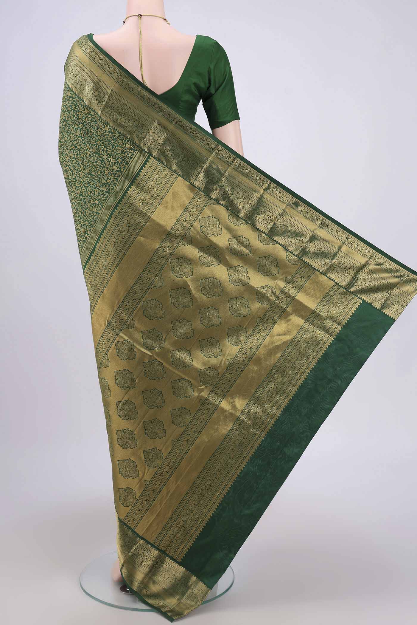 Flat view of Green Bangalore Silk Saree with Zari Brocade on the body and Zari Border. 