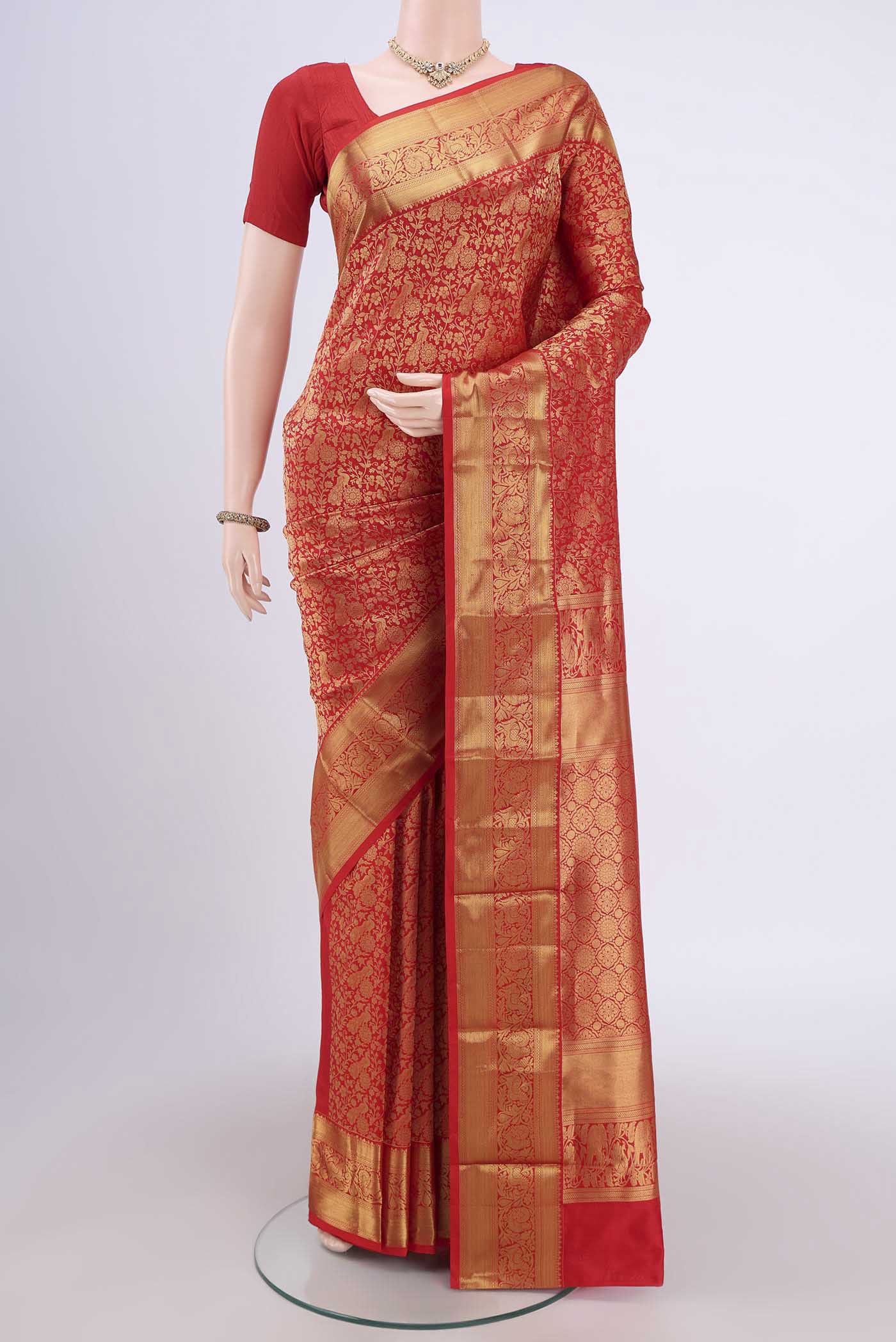 Red Bangalore Silk Saree with Zari Brocade on the body and Zari Border.  displayed on a mannequin