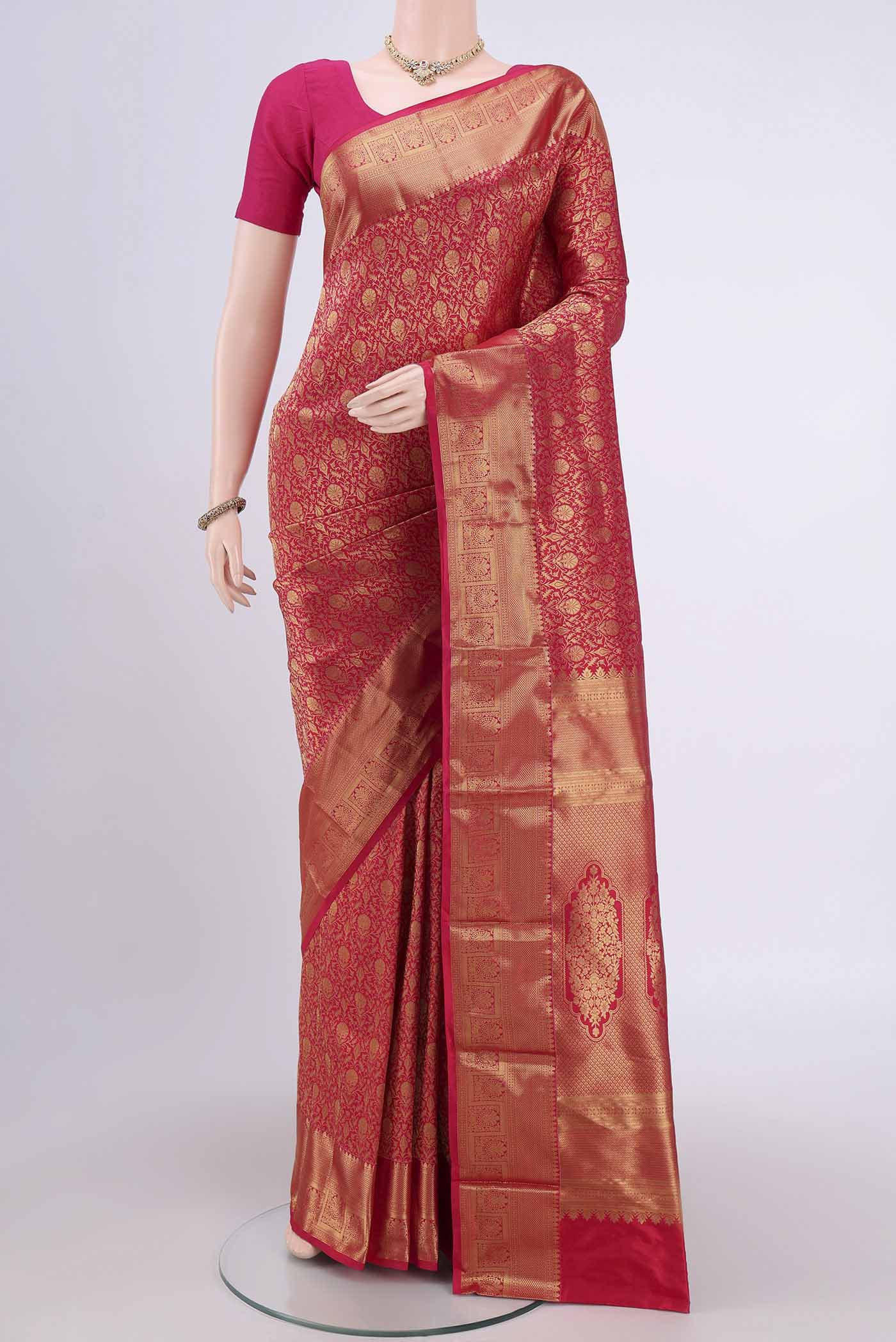 Dark Pink Bangalore Silk Saree with Zari Brocade on the body and Zari Border.  displayed on a mannequin