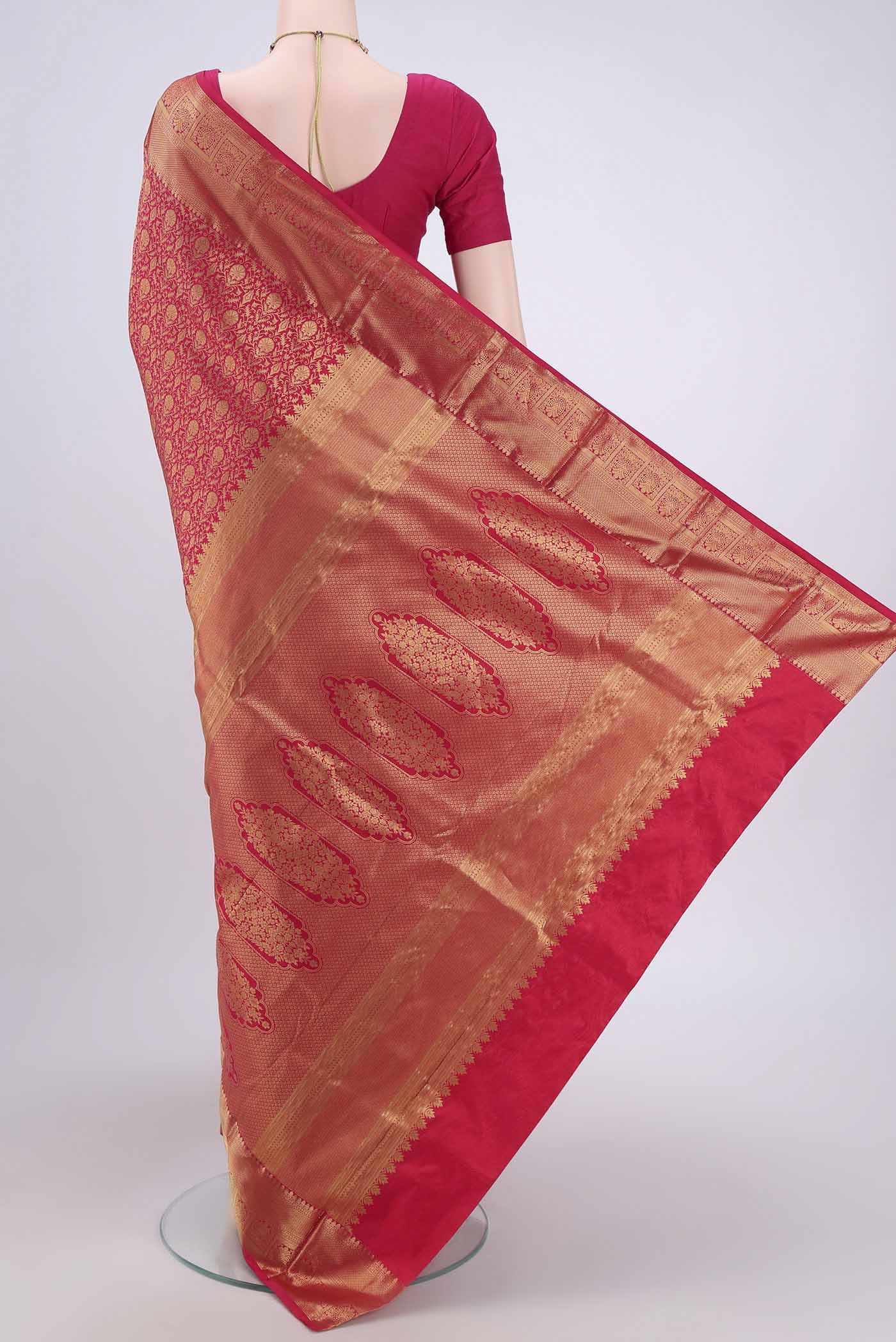 Flat view of Dark Pink Bangalore Silk Saree with Zari Brocade on the body and Zari Border. 