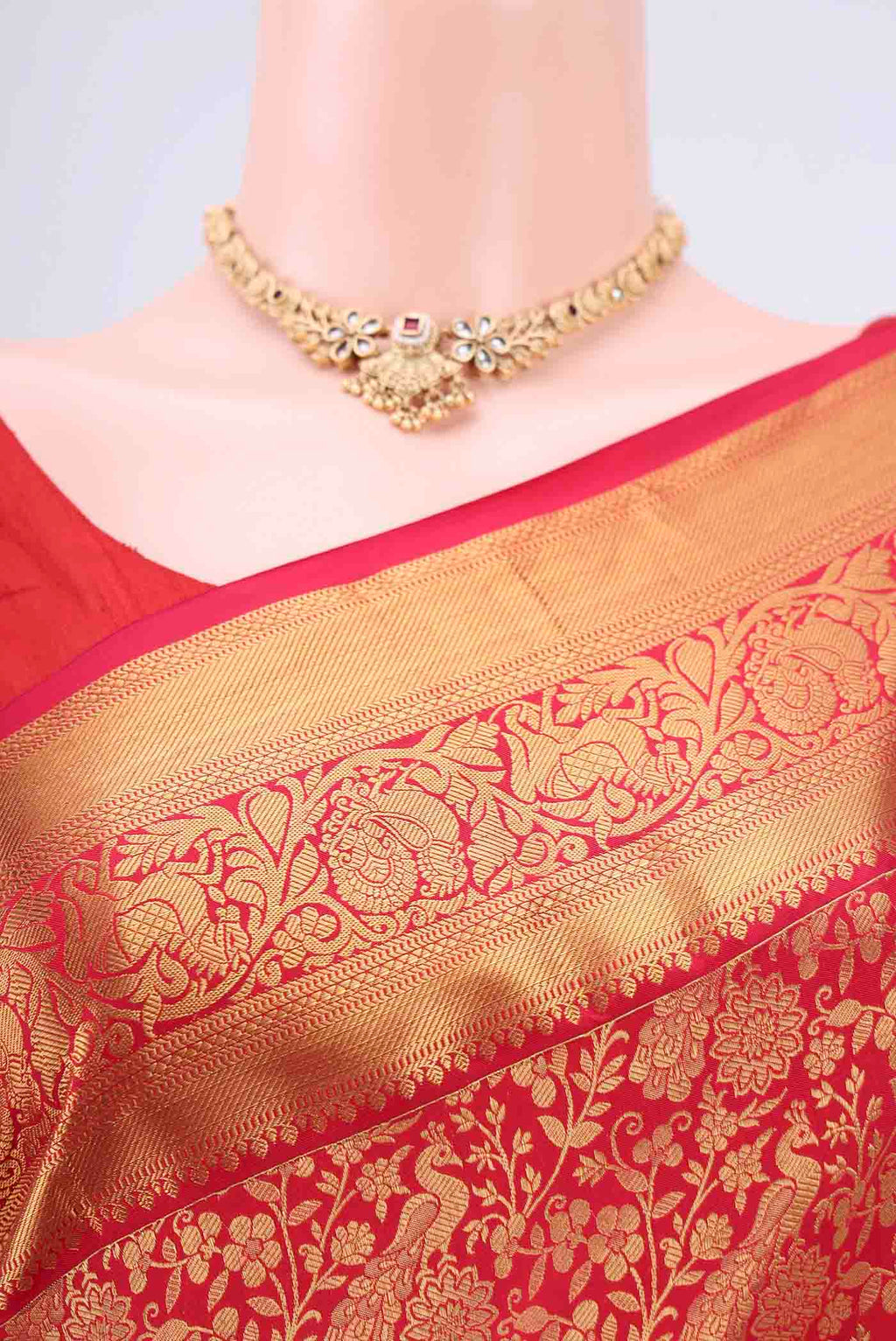 Border image of Red Bangalore Silk Saree with Zari Brocade on the body and Zari Border. 
