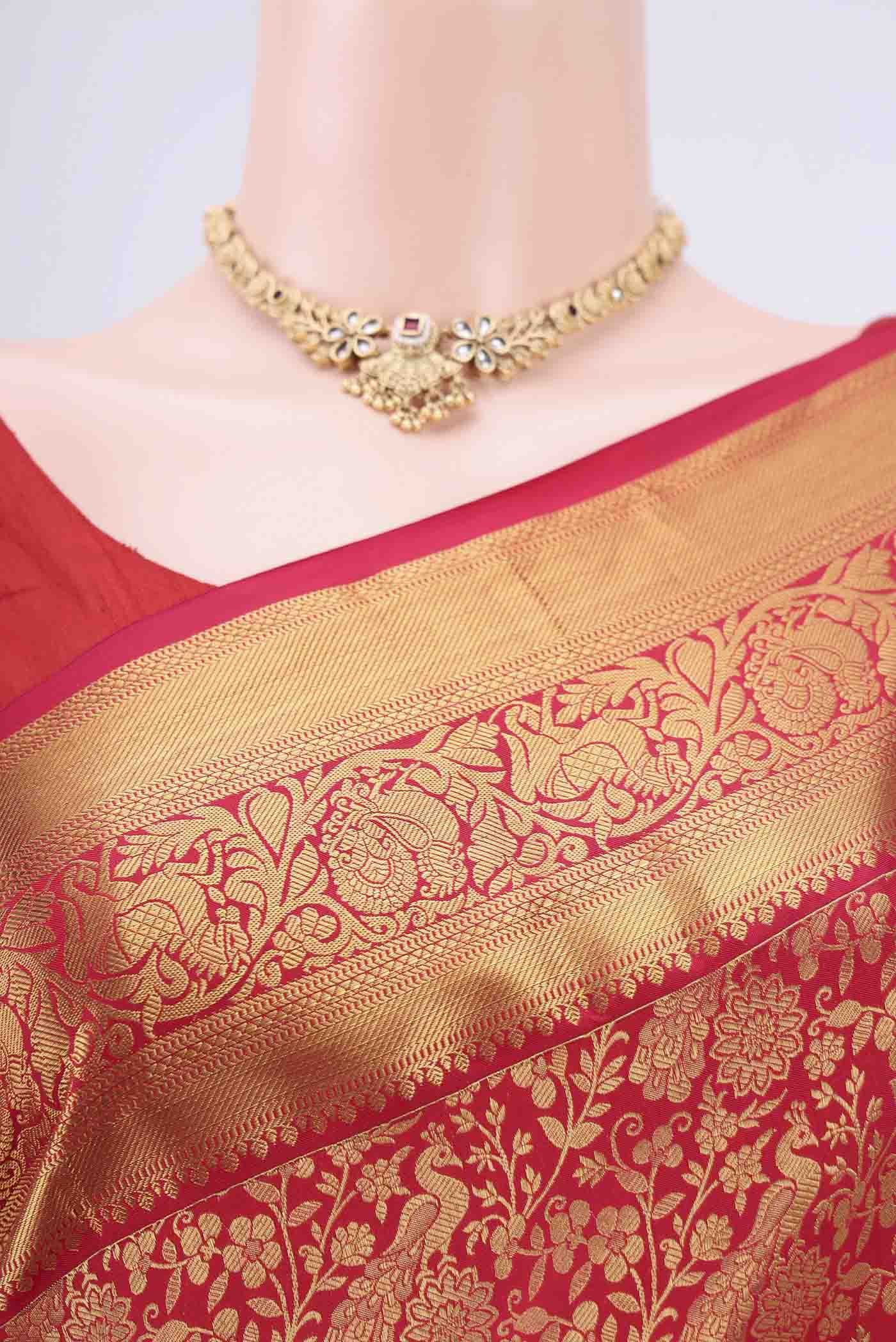 Border image of Red Bangalore Silk Saree with Zari Brocade on the body and Zari Border. 