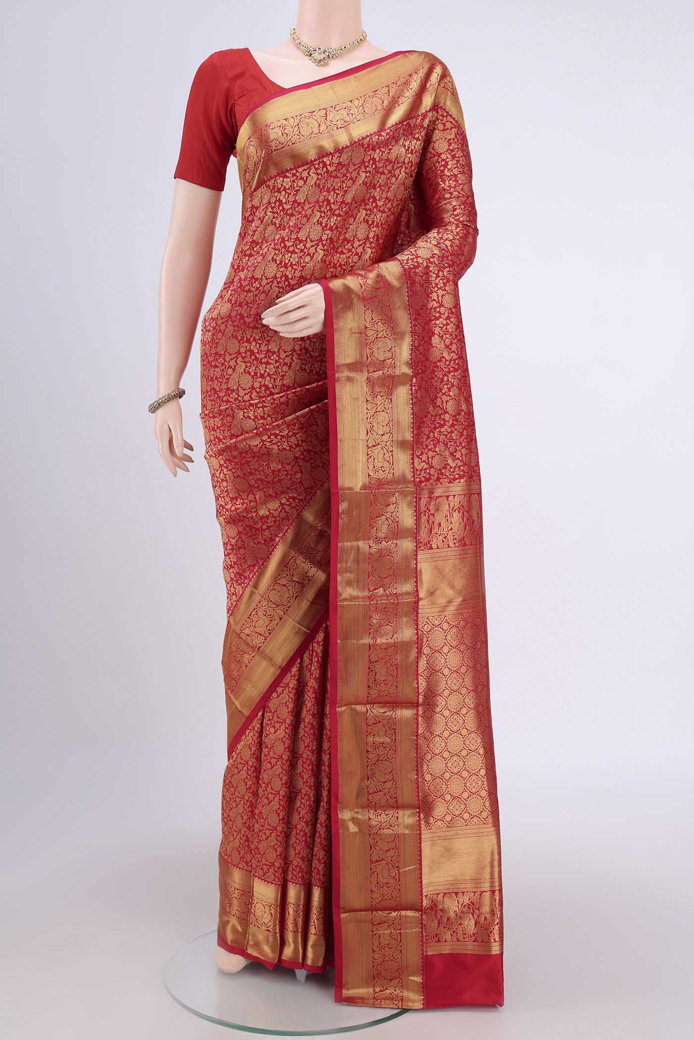 Red Bangalore Silk Saree with Zari Brocade on the body and Zari Border.  displayed on a mannequin