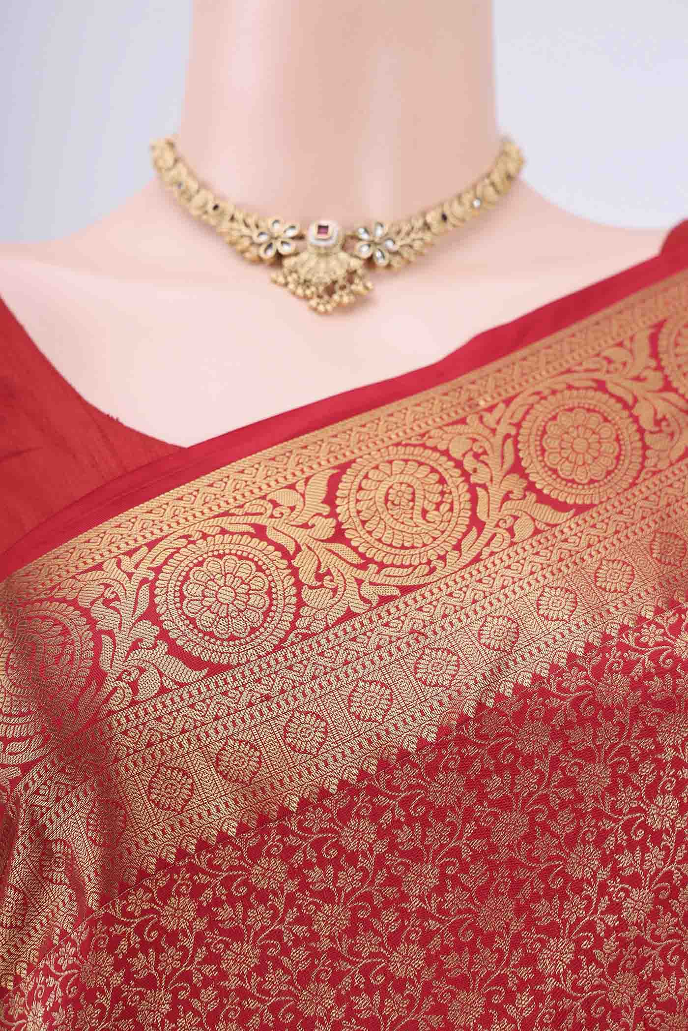 Border image of Red Bangalore Silk Saree with Zari Brocade on the body and Zari Border. 