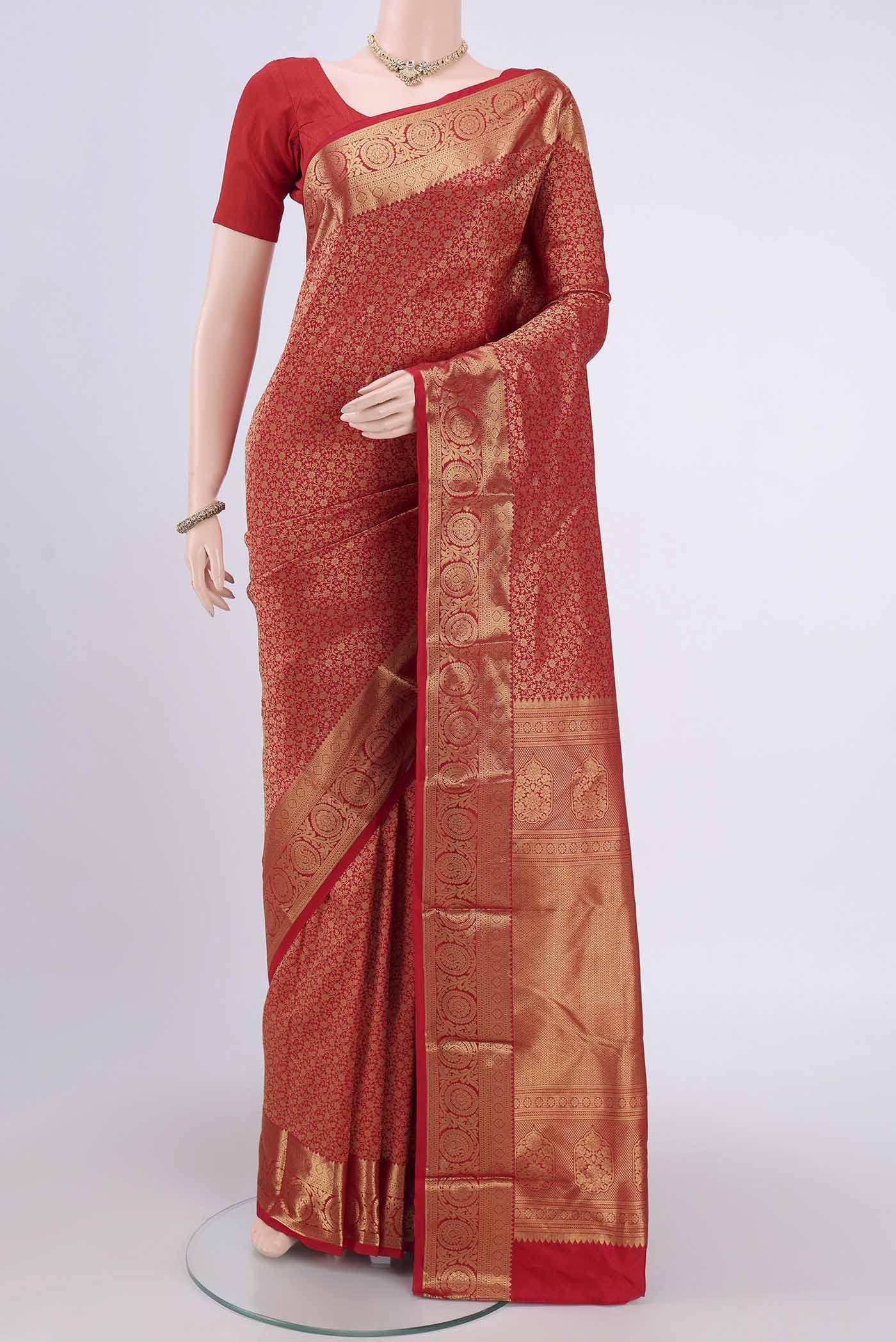Red Bangalore Silk Saree with Zari Brocade on the body and Zari Border.  displayed on a mannequin