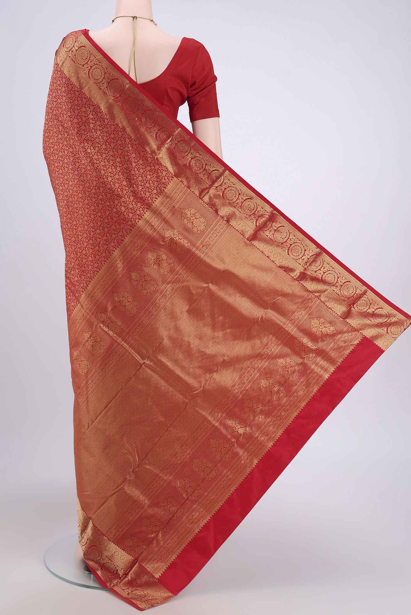Flat view of Red Bangalore Silk Saree with Zari Brocade on the body and Zari Border. 